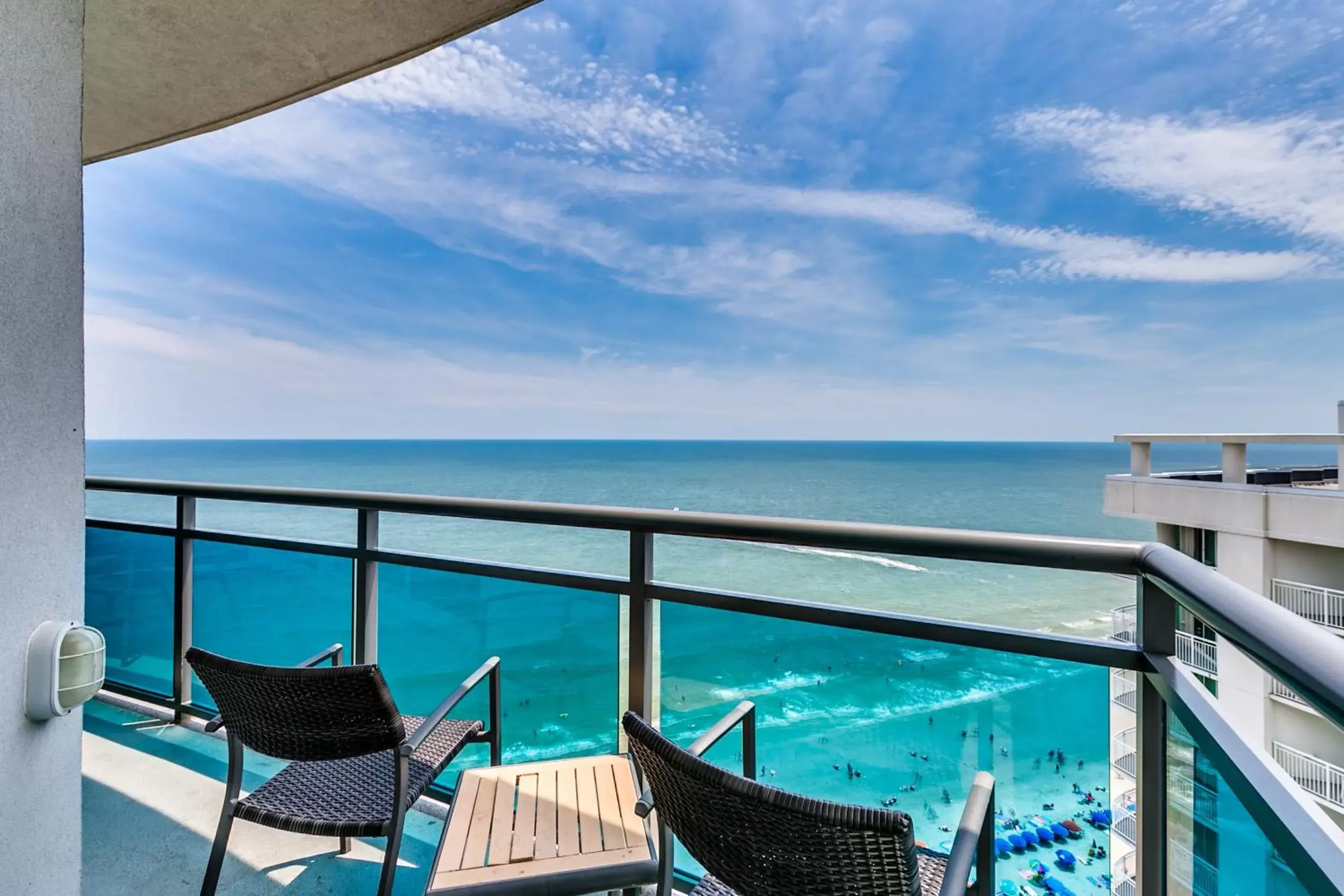 Balcony/Terrace, Pool View in Oceans One Resort