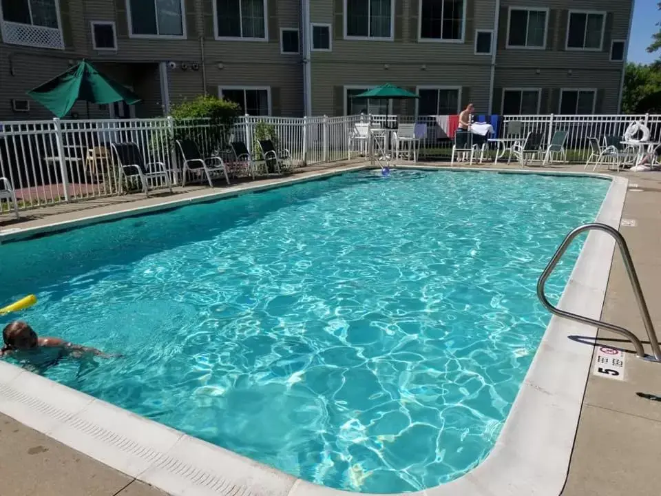 Patio, Swimming Pool in Country Inn & Suites by Radisson Lake George