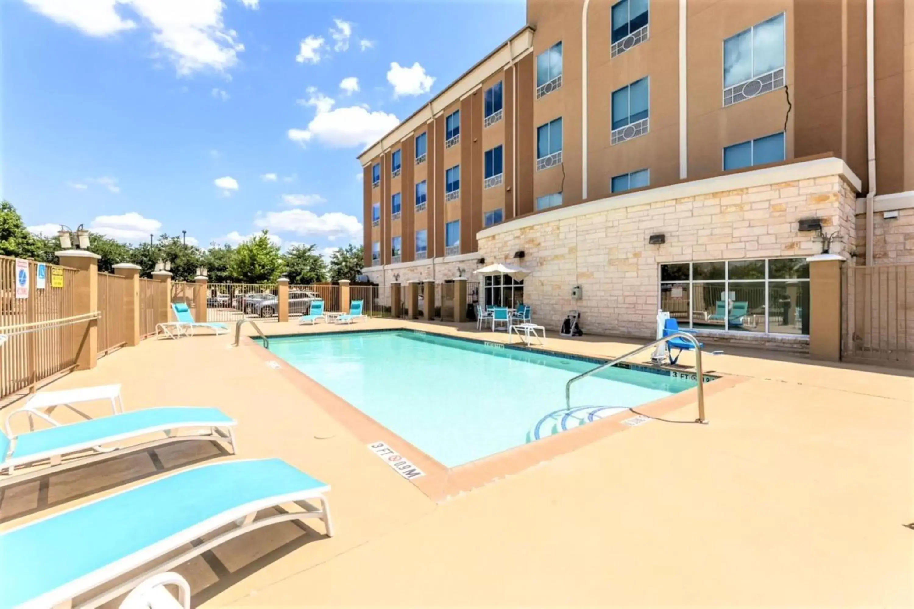 Swimming pool, Property Building in Holiday Inn Express & Suites Houston East - Baytown, an IHG Hotel