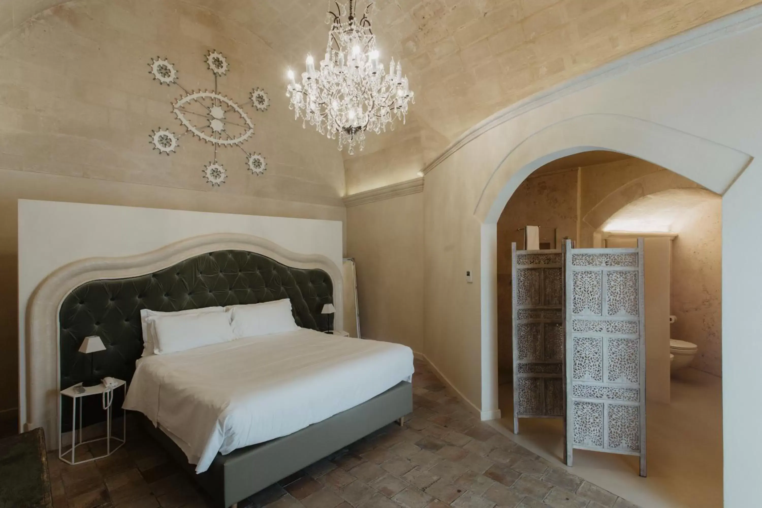 Bed in Palazzo Del Duca Luxury Hotel & Restaurant