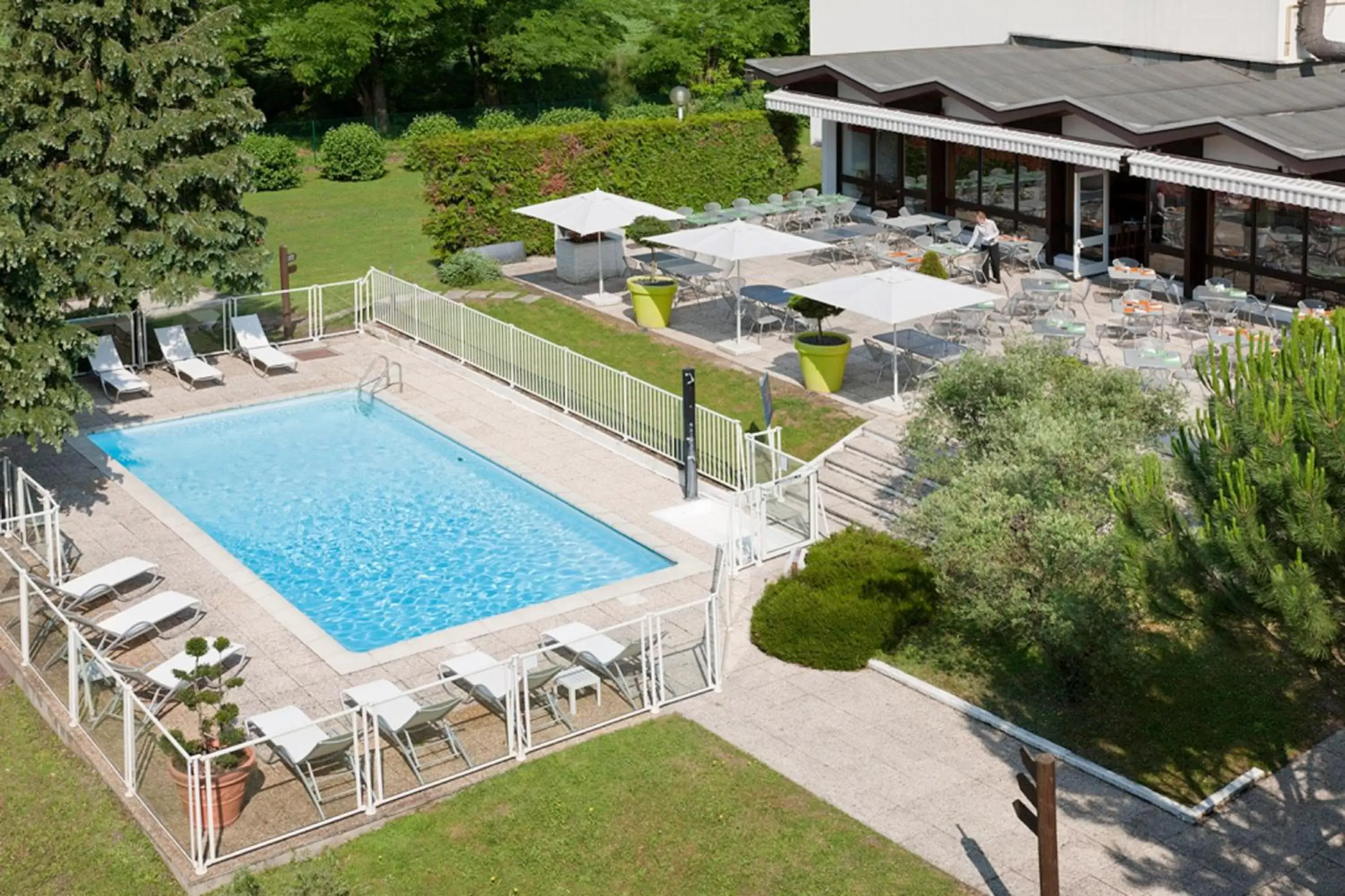 Swimming pool, Pool View in Novotel Grenoble Nord Voreppe