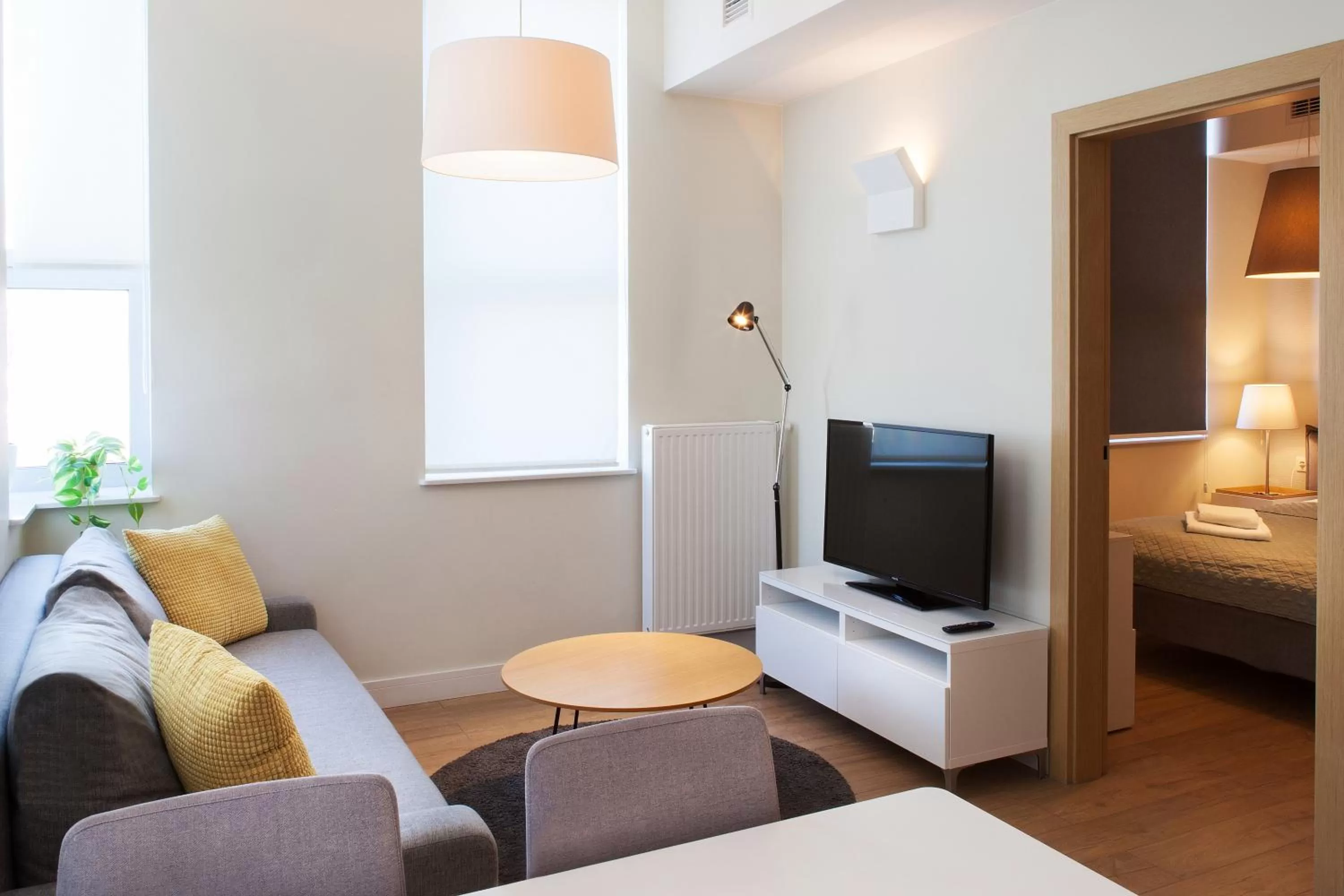 Living room, Bed in Riverside Aparthotel Cracow