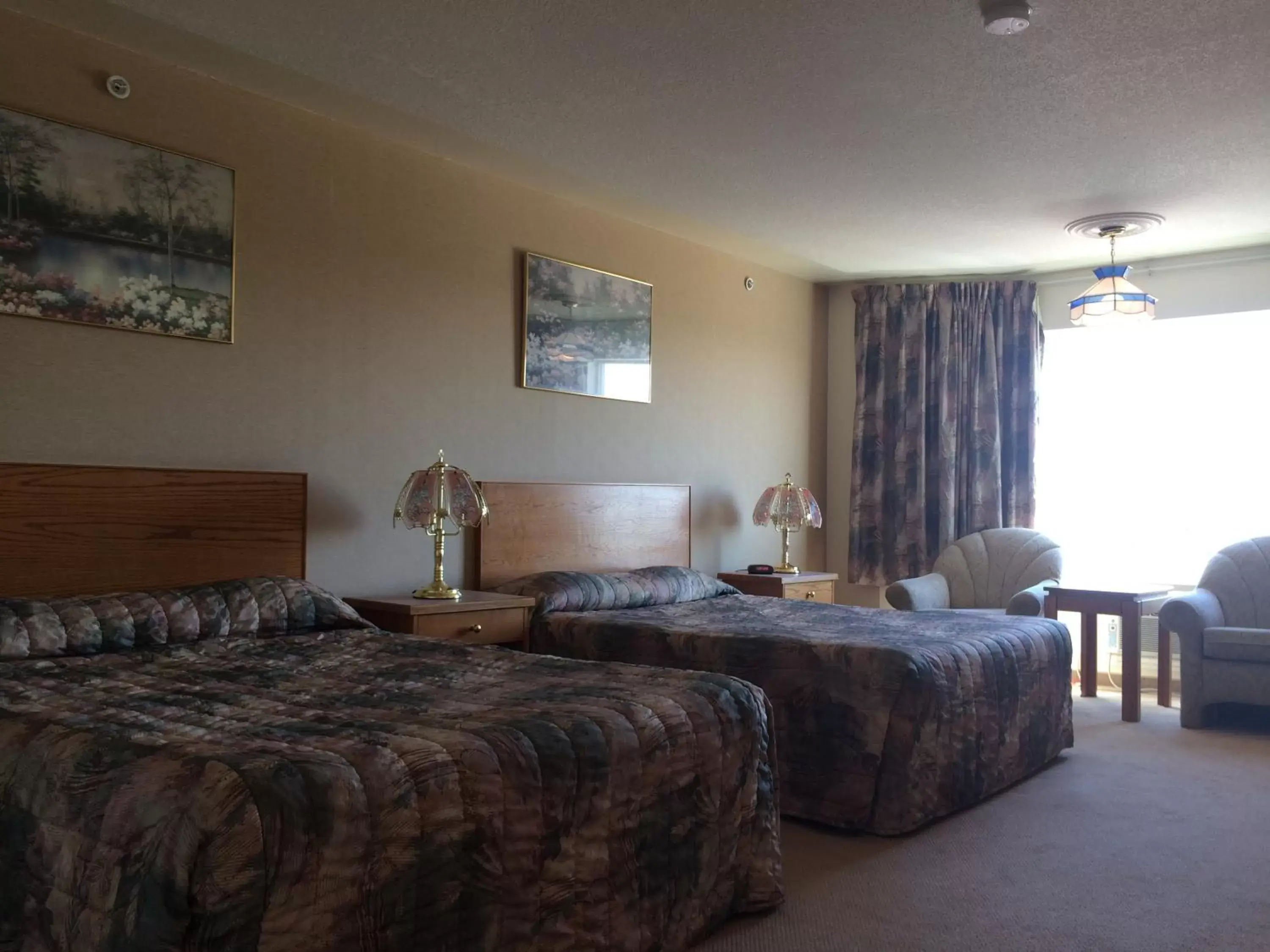 Bed in Western Budget Motel #1 & 2 Whitecourt