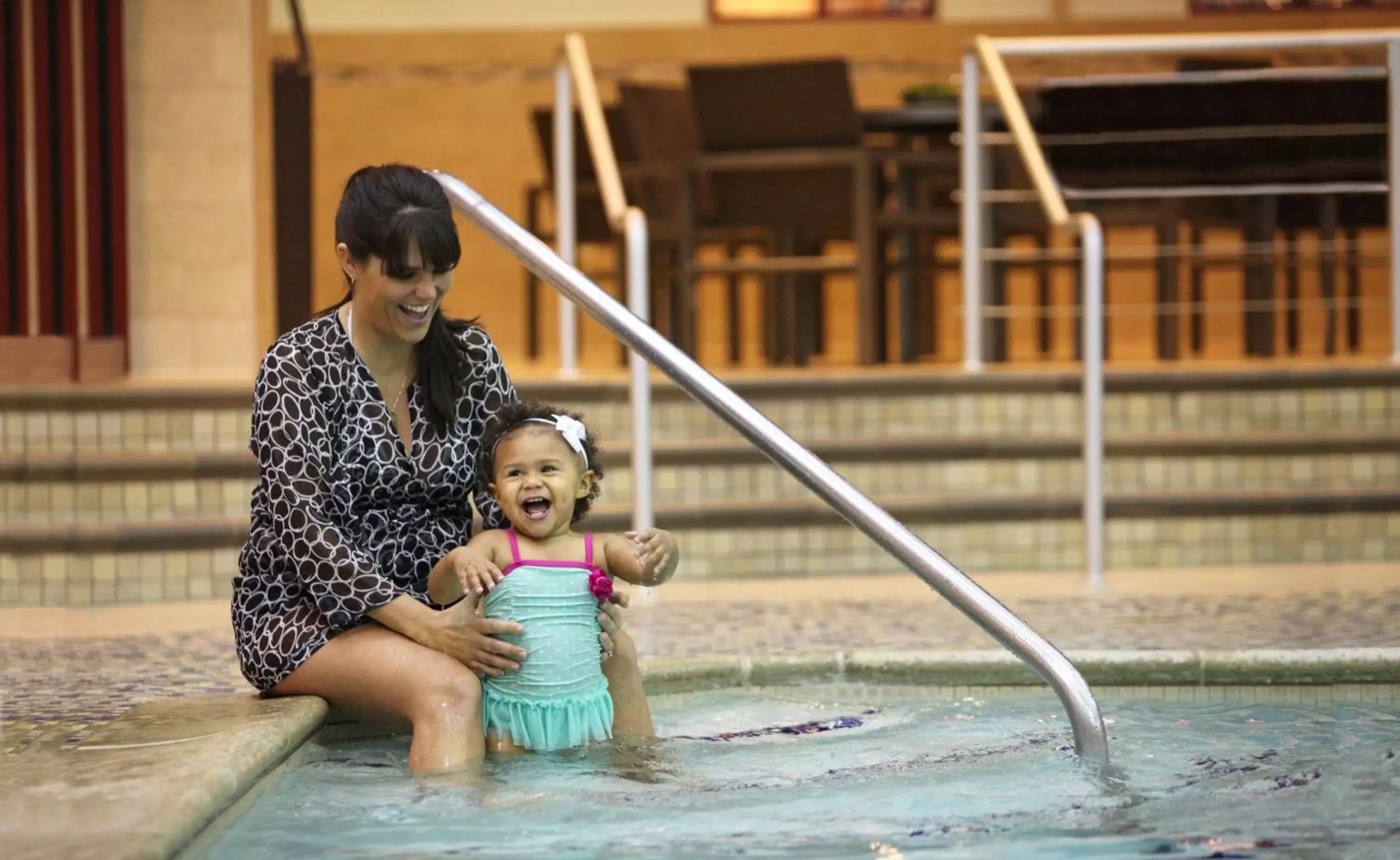 Swimming pool, Family in Crowne Plaza Lansing West, an IHG Hotel
