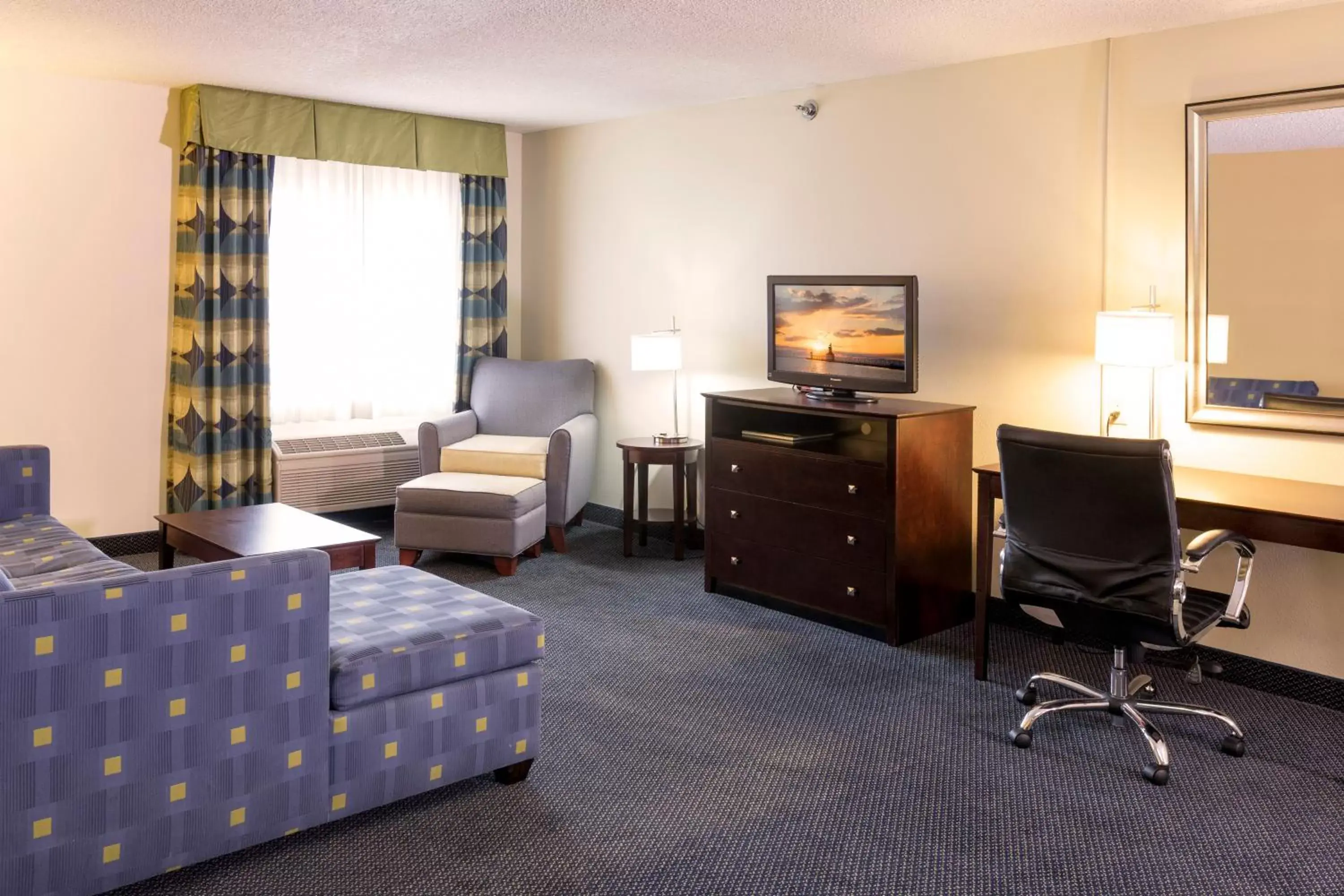 Photo of the whole room, TV/Entertainment Center in Holiday Inn Express Hotel & Suites-Saint Joseph, an IHG Hotel