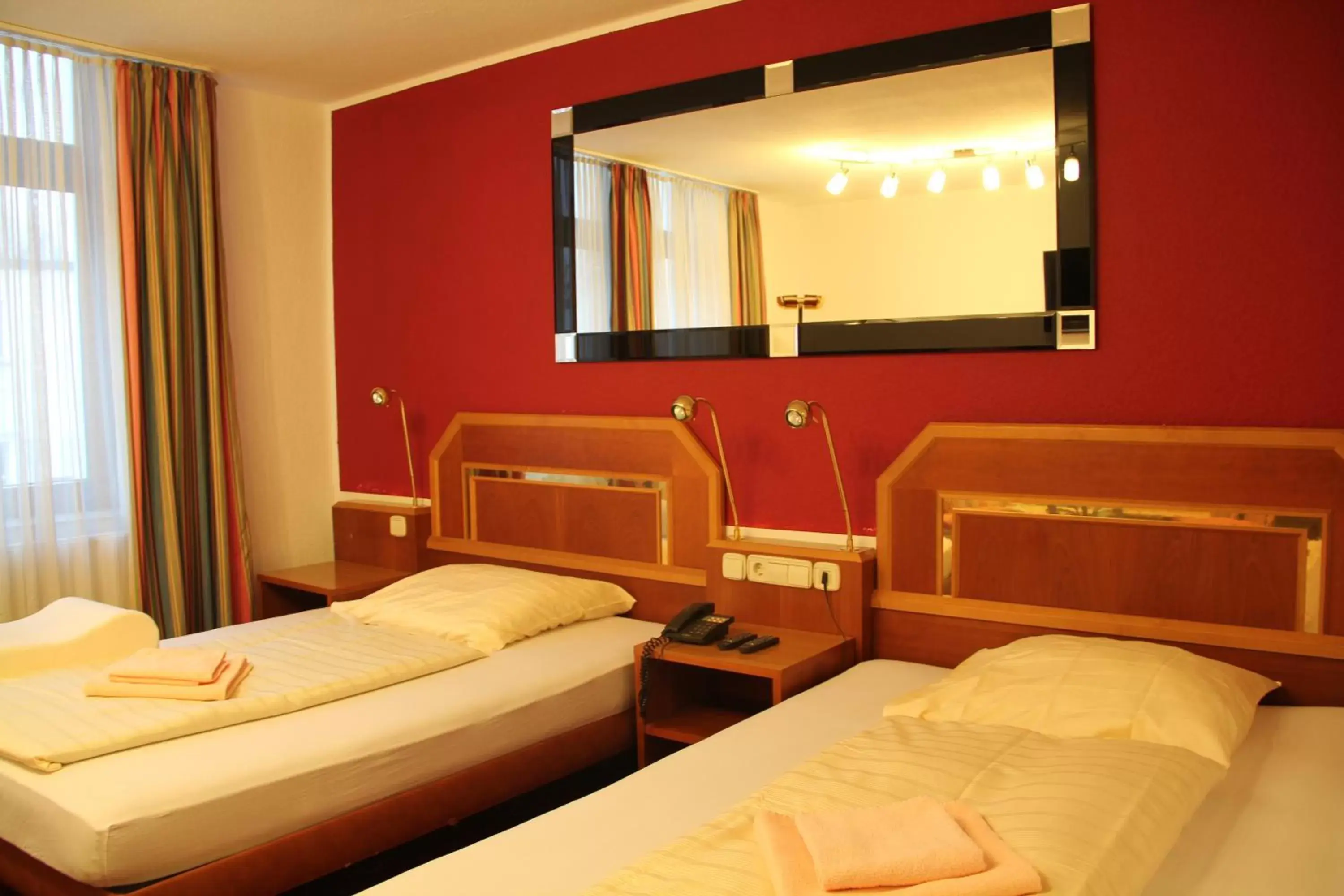 Bed in Wali's Hotel Bed in Wali's Hotel