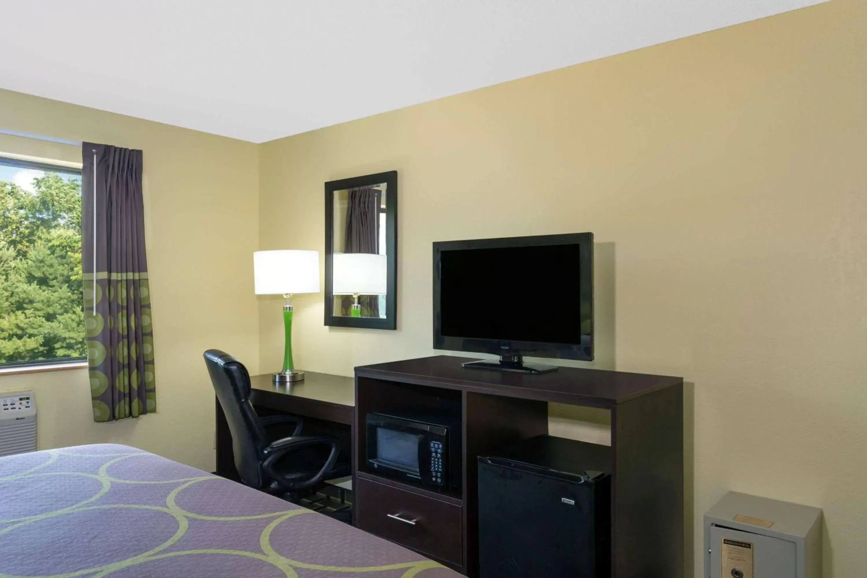 Photo of the whole room, TV/Entertainment Center in Super 8 by Wyndham Marietta