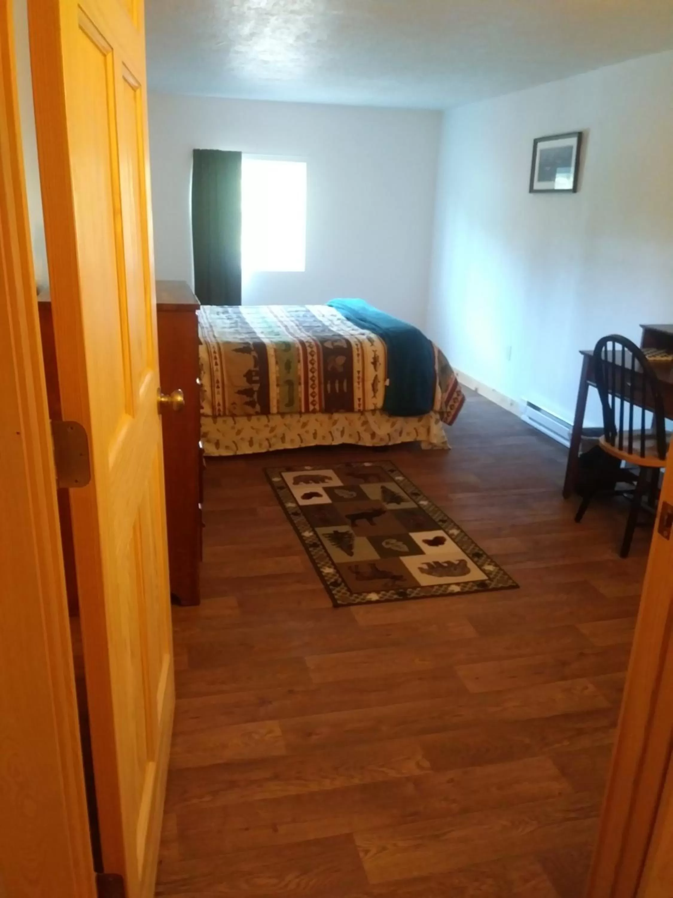 Photo of the whole room, Bed in Whispering Winds Retreat B&B