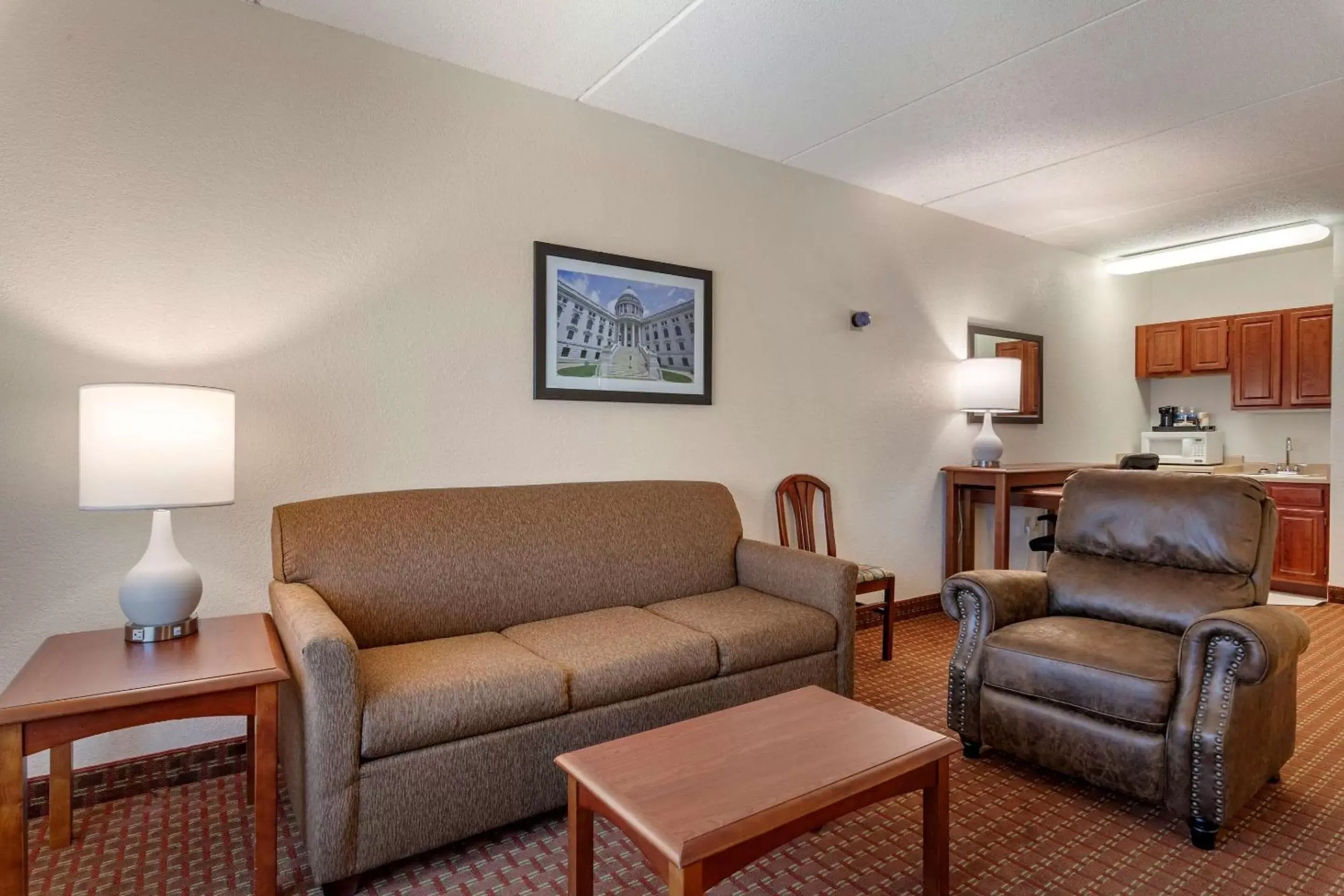 Bedroom, Seating Area in Clarion Suites at The Alliant Energy Center