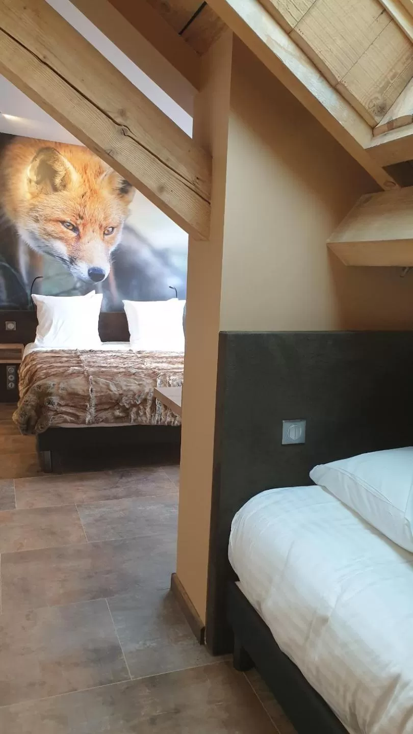 Photo of the whole room, Bed in Les Loges Du Parc