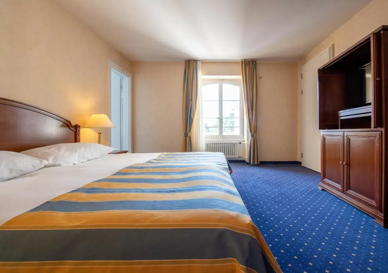 Bedroom, Bed in Grand Hotel et Centre Thermal d'Yverdon-les-Bains