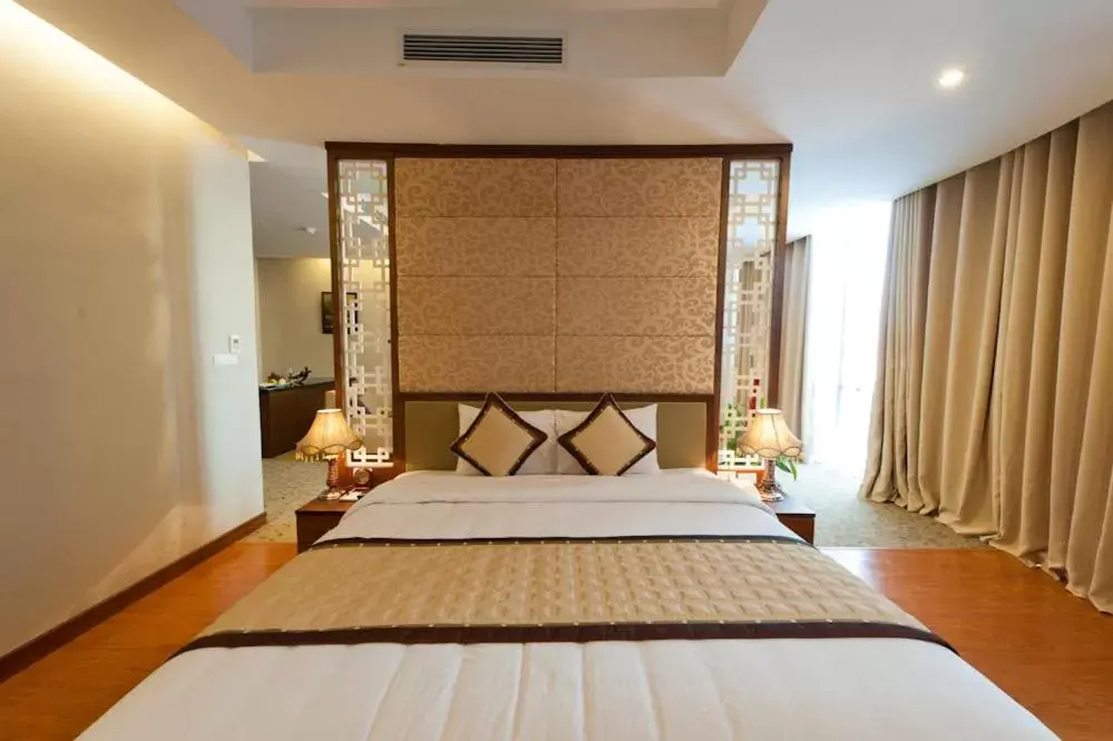 Bed in Muong Thanh Grand Xa La Hotel