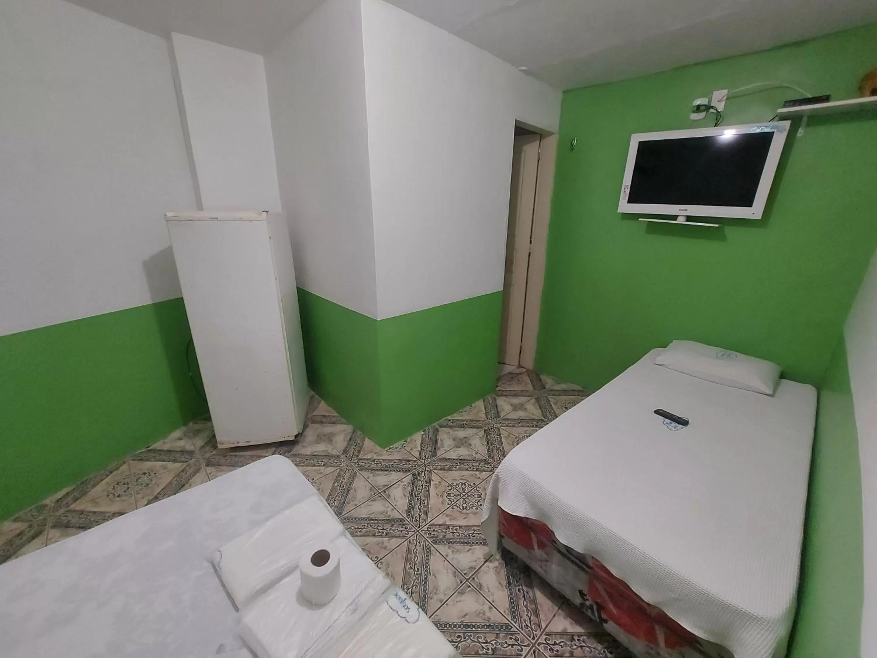 Bed in Hotel Pousada dos Sonhos