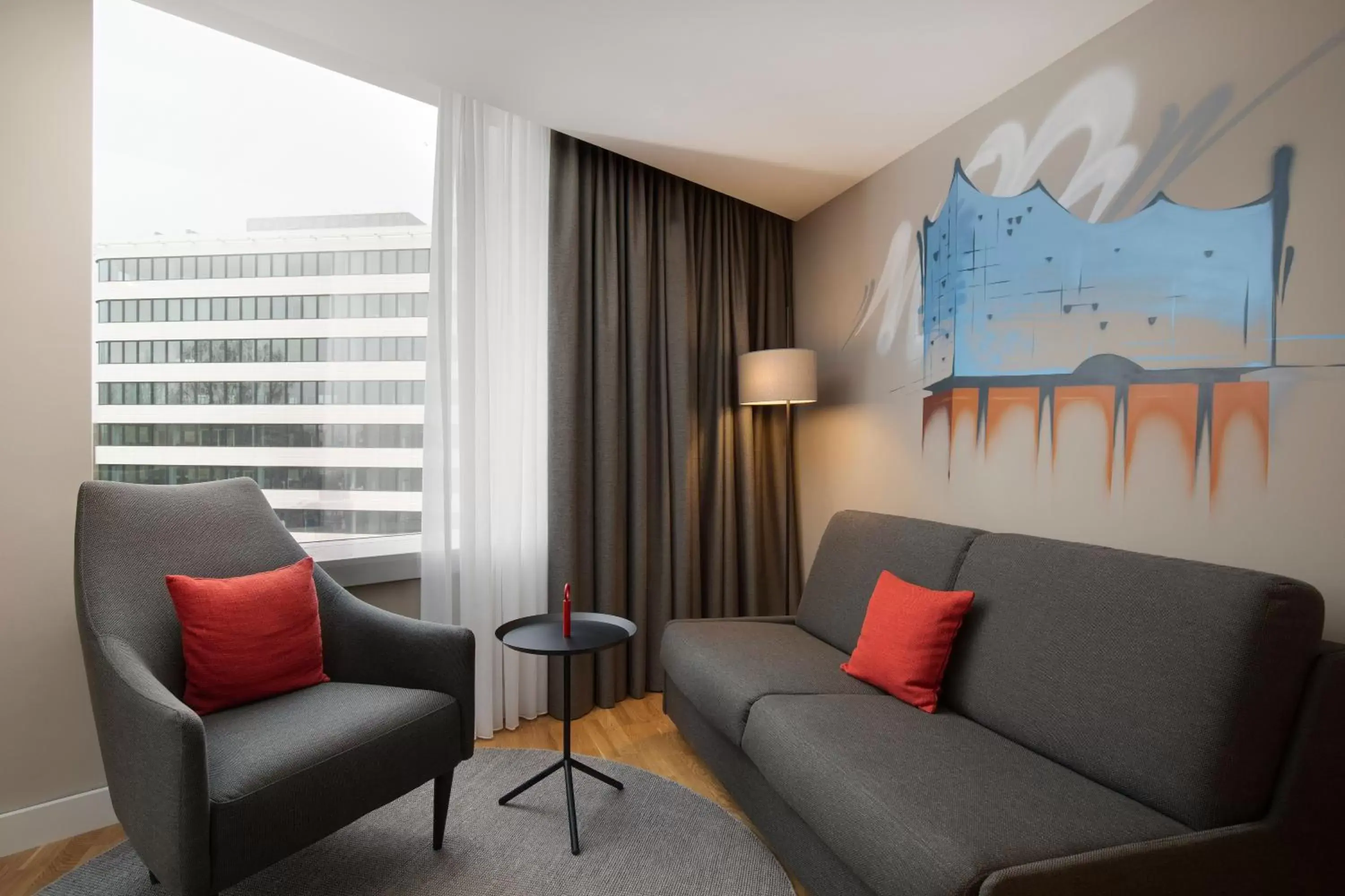 Bedroom, Seating Area in Holiday Inn Hamburg - City Nord, an IHG Hotel