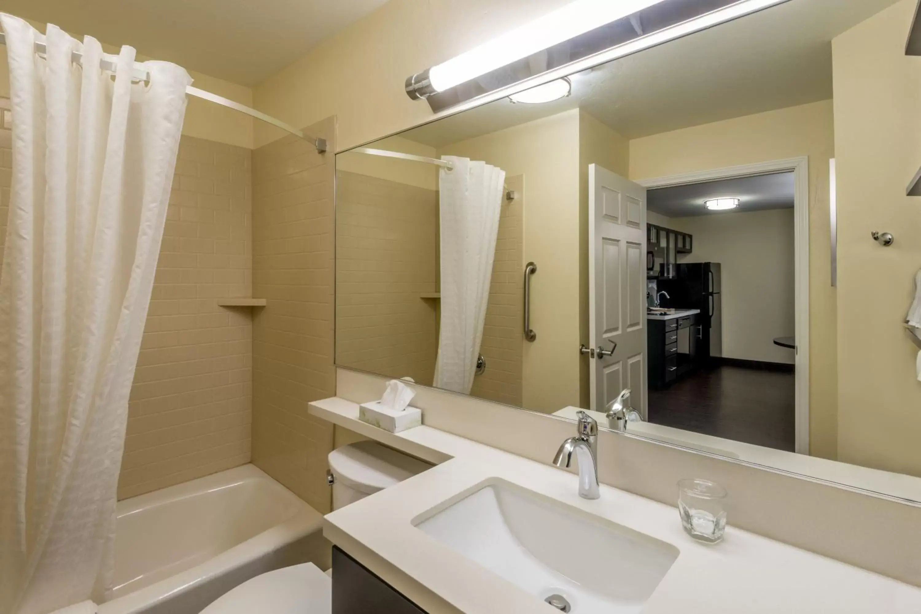 Bedroom, Bathroom in Candlewood Suites Del City, an IHG Hotel