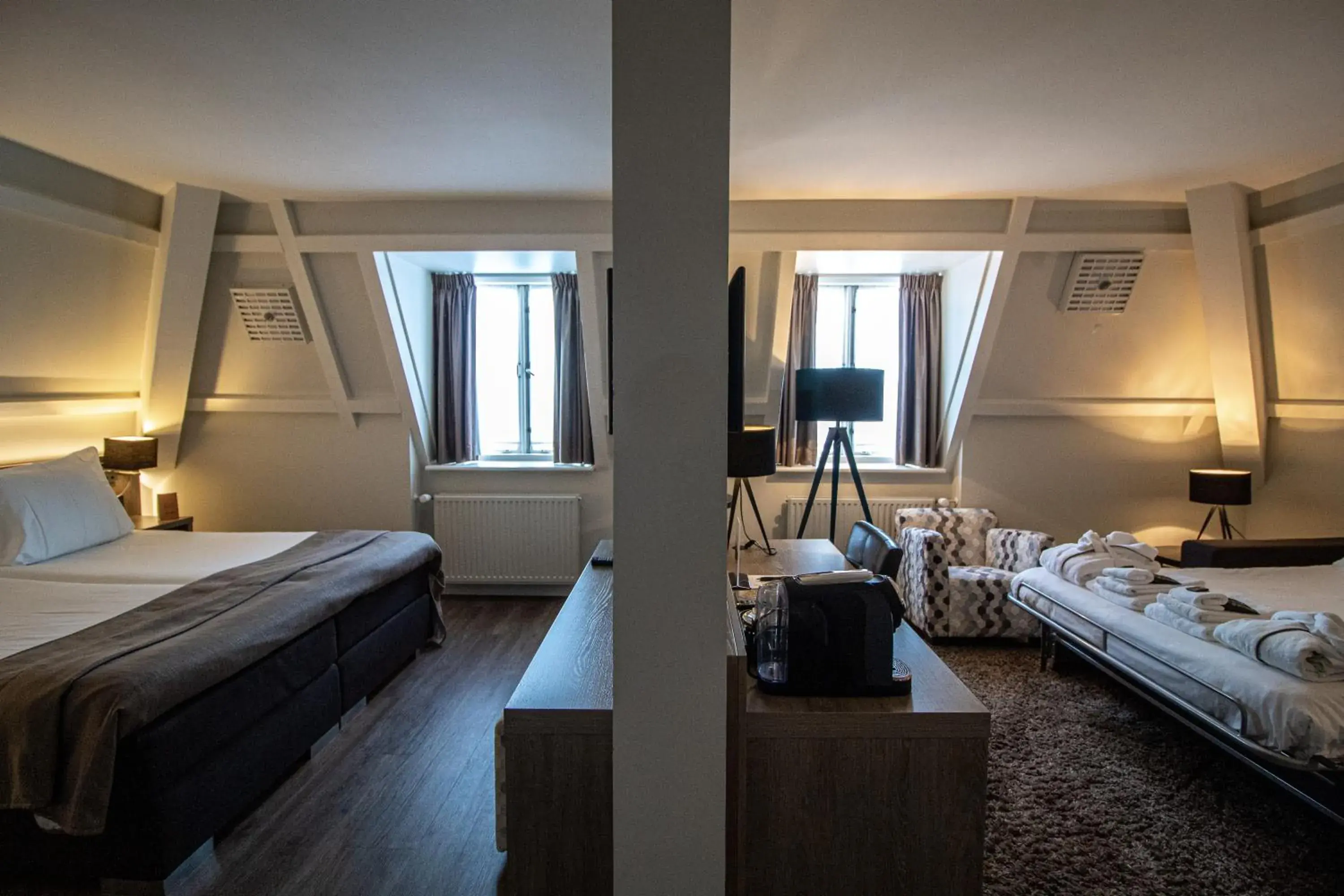 Photo of the whole room, Bed in Grand Hotel en Résidence De Draak Photo of the whole room, Bed in Grand Hotel en Résidence De Draak