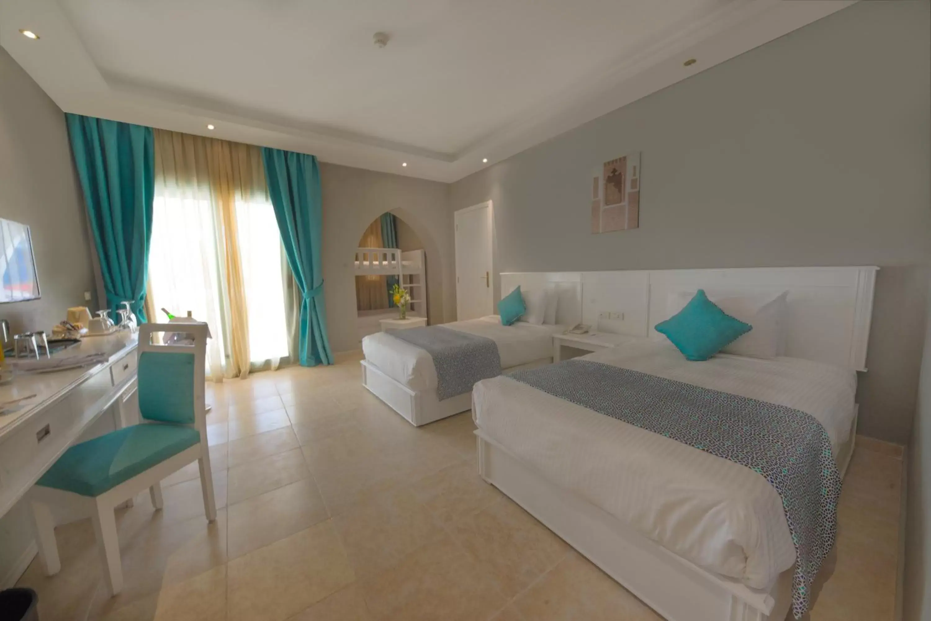 Family Room with Bunk Bed in Sunrise Garden Beach Resort