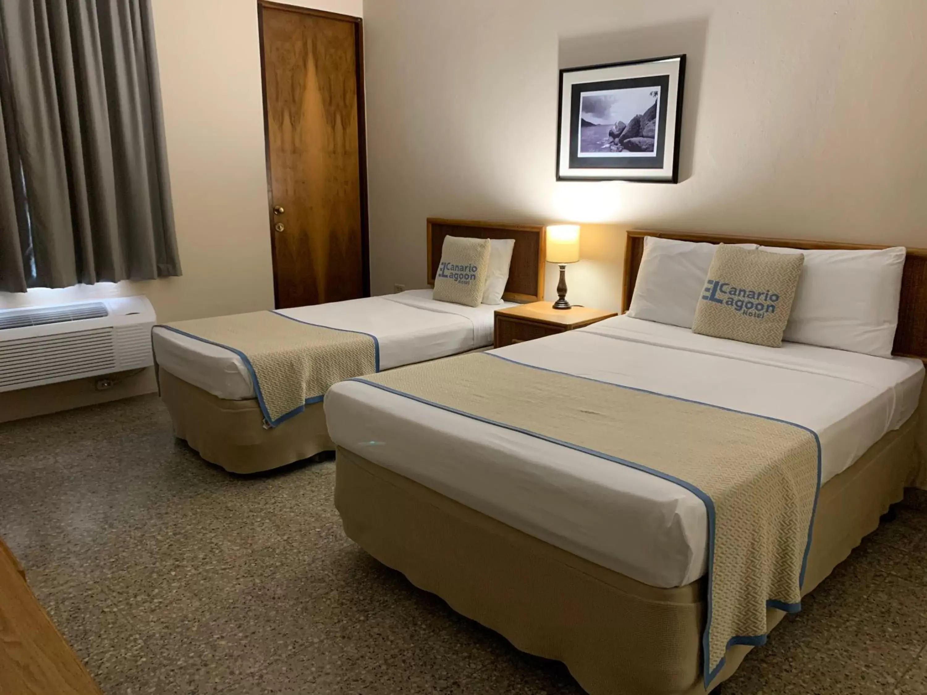 Bed in Canario Lagoon Hotel