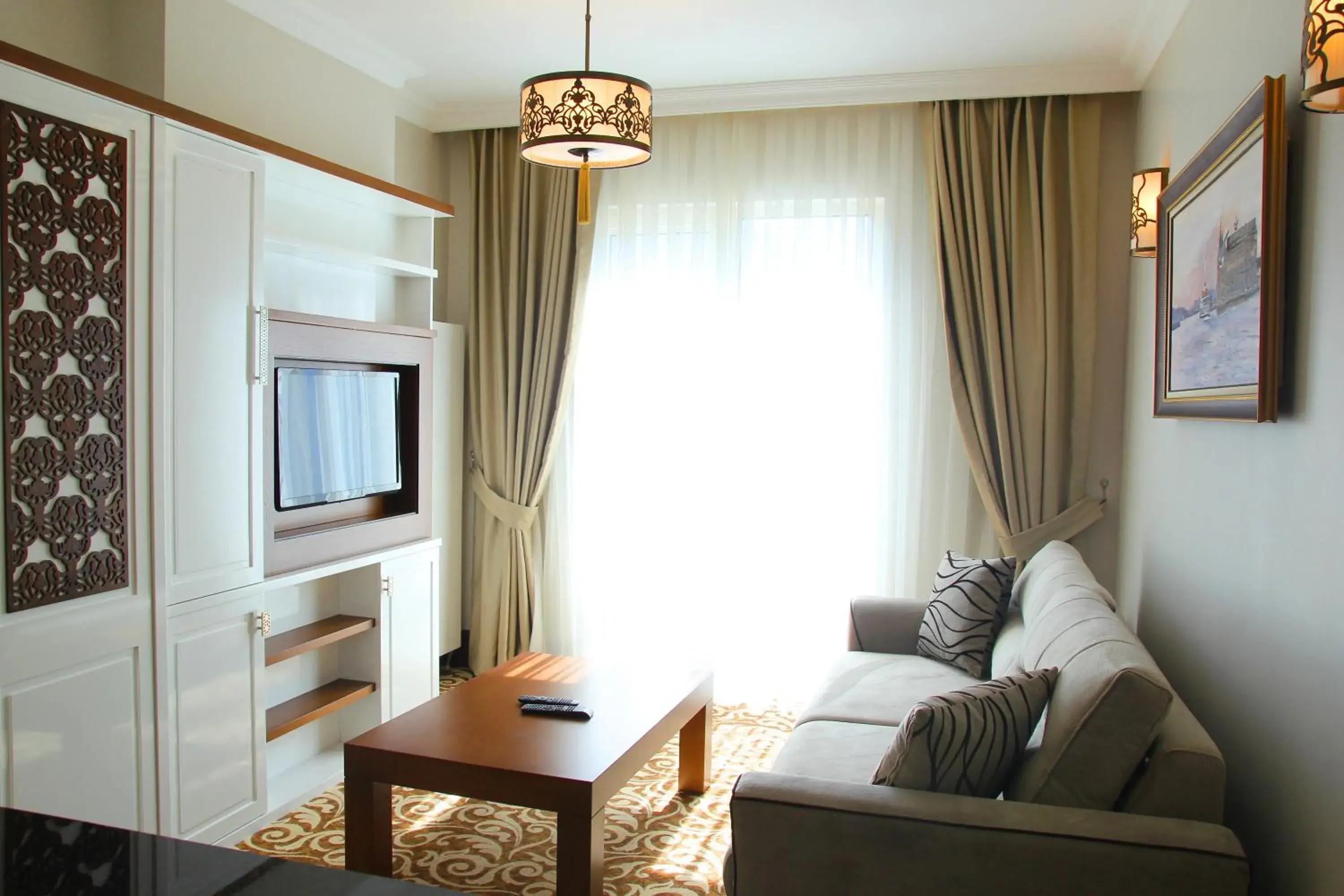 Living room, Seating Area in K Suites Hotel