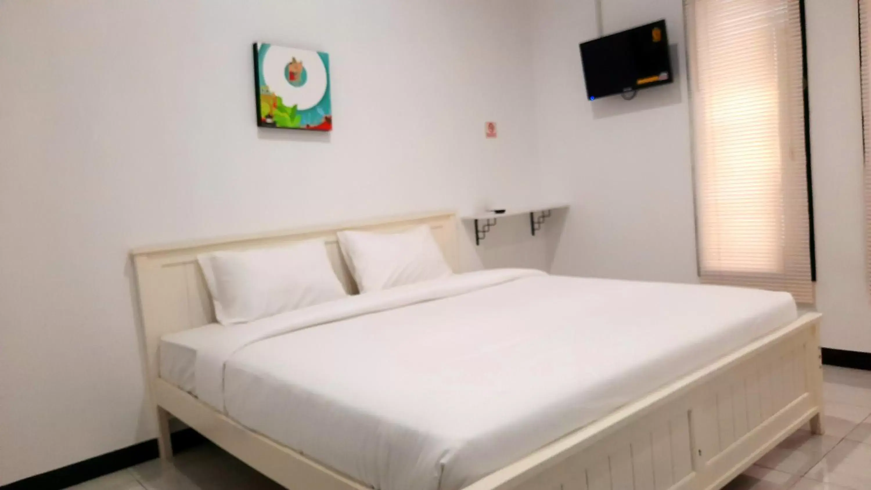 Bed in COZY STAY KUPANG