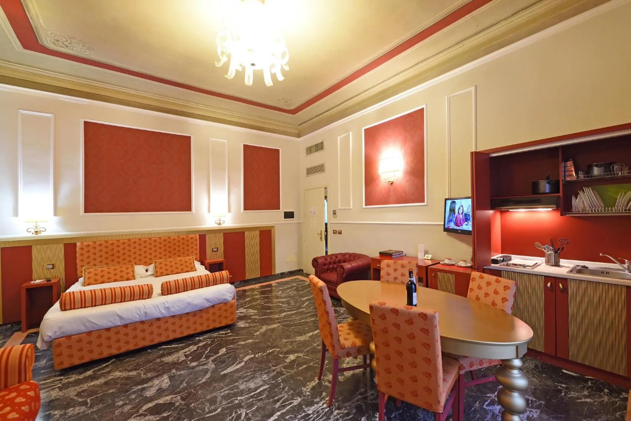 Kitchen or kitchenette, Bed in Relais La Corte di Cloris