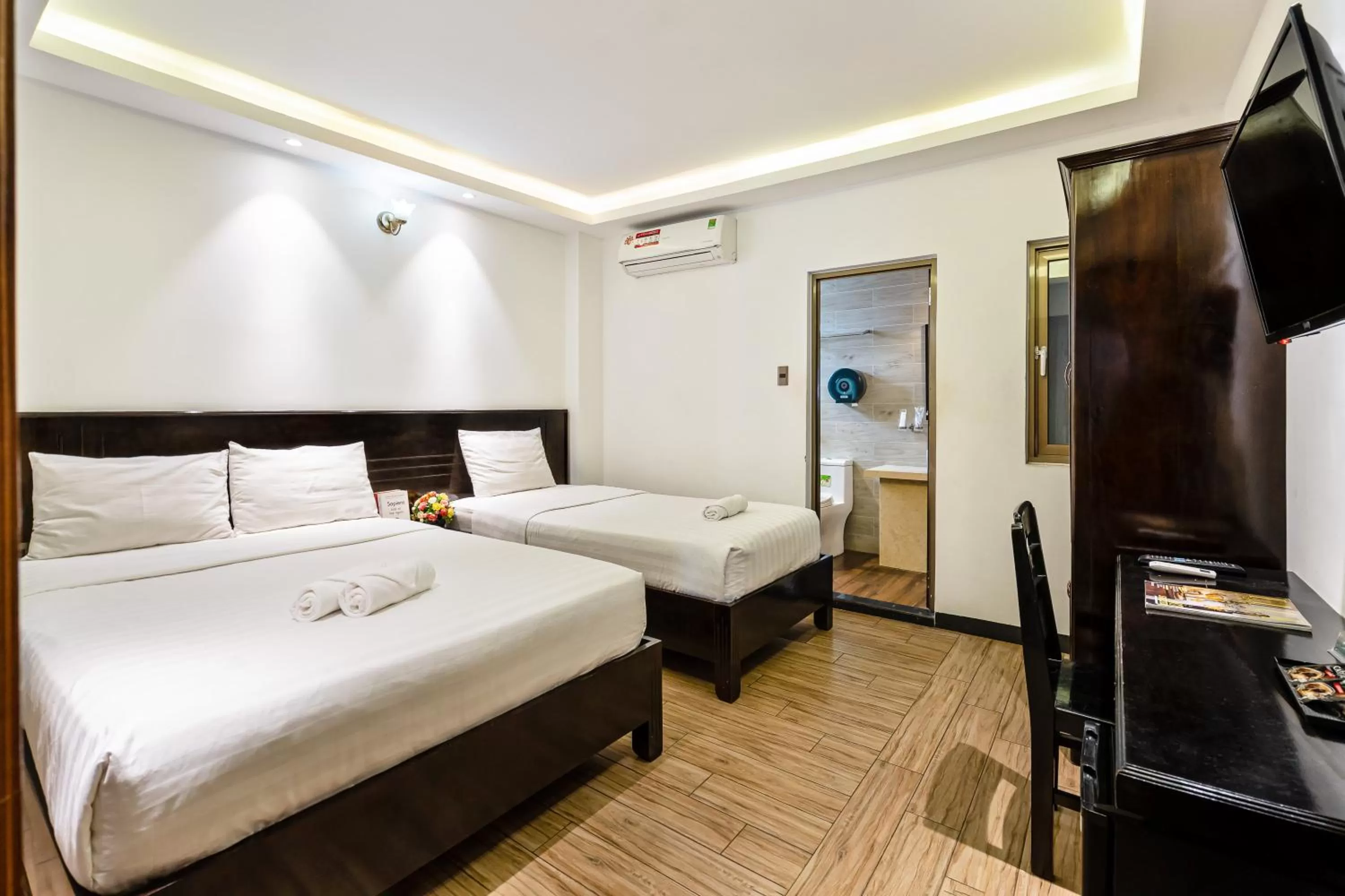 Bed in Lotus Laverne Hotel