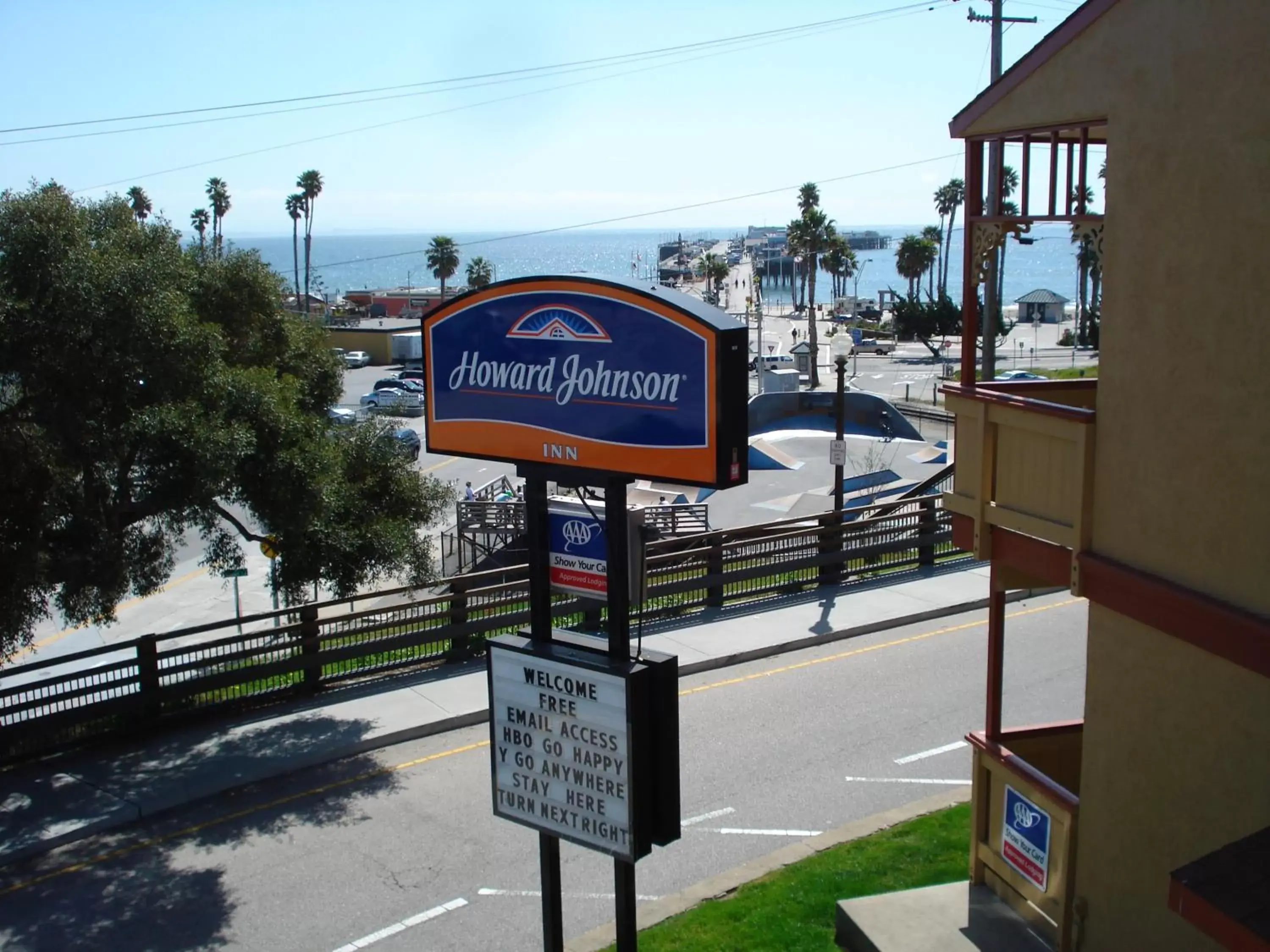 Property logo or sign in Howard Johnson by Wyndham Santa Cruz Beach Boardwalk