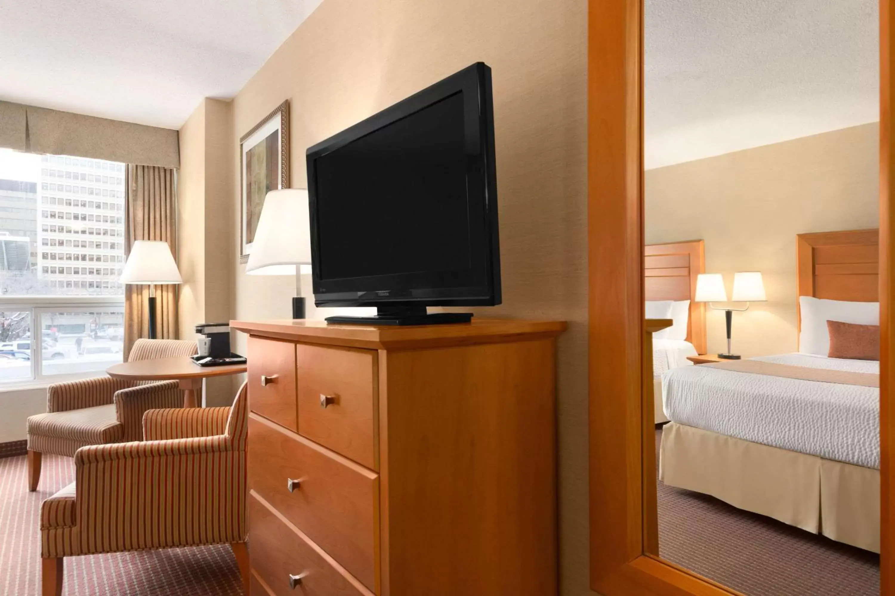 Photo of the whole room, TV/Entertainment Center in Days Inn by Wyndham Edmonton Downtown