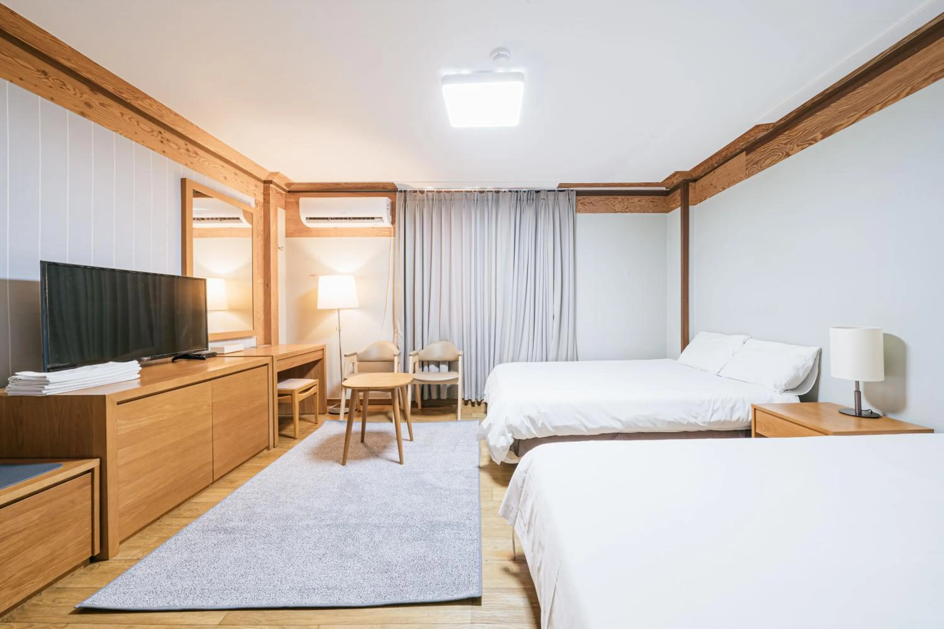 Bed in Jeju Miracle Hotel