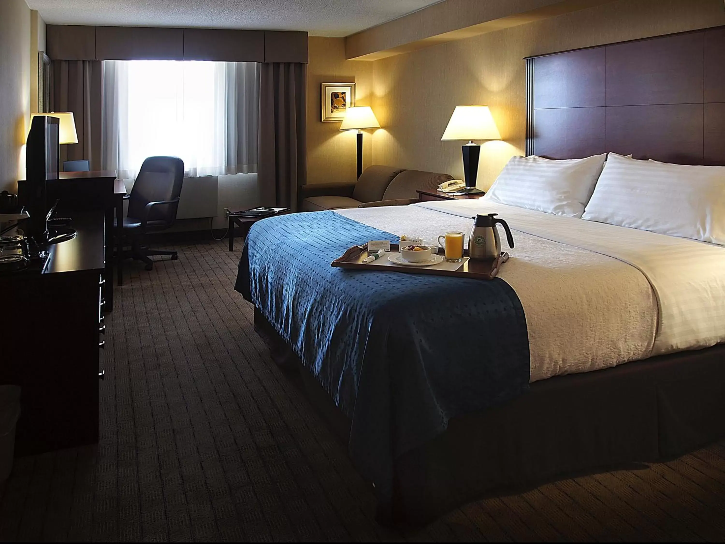 Photo of the whole room, Bed in Holiday Inn & Suites Winnipeg Downtown, an IHG Hotel