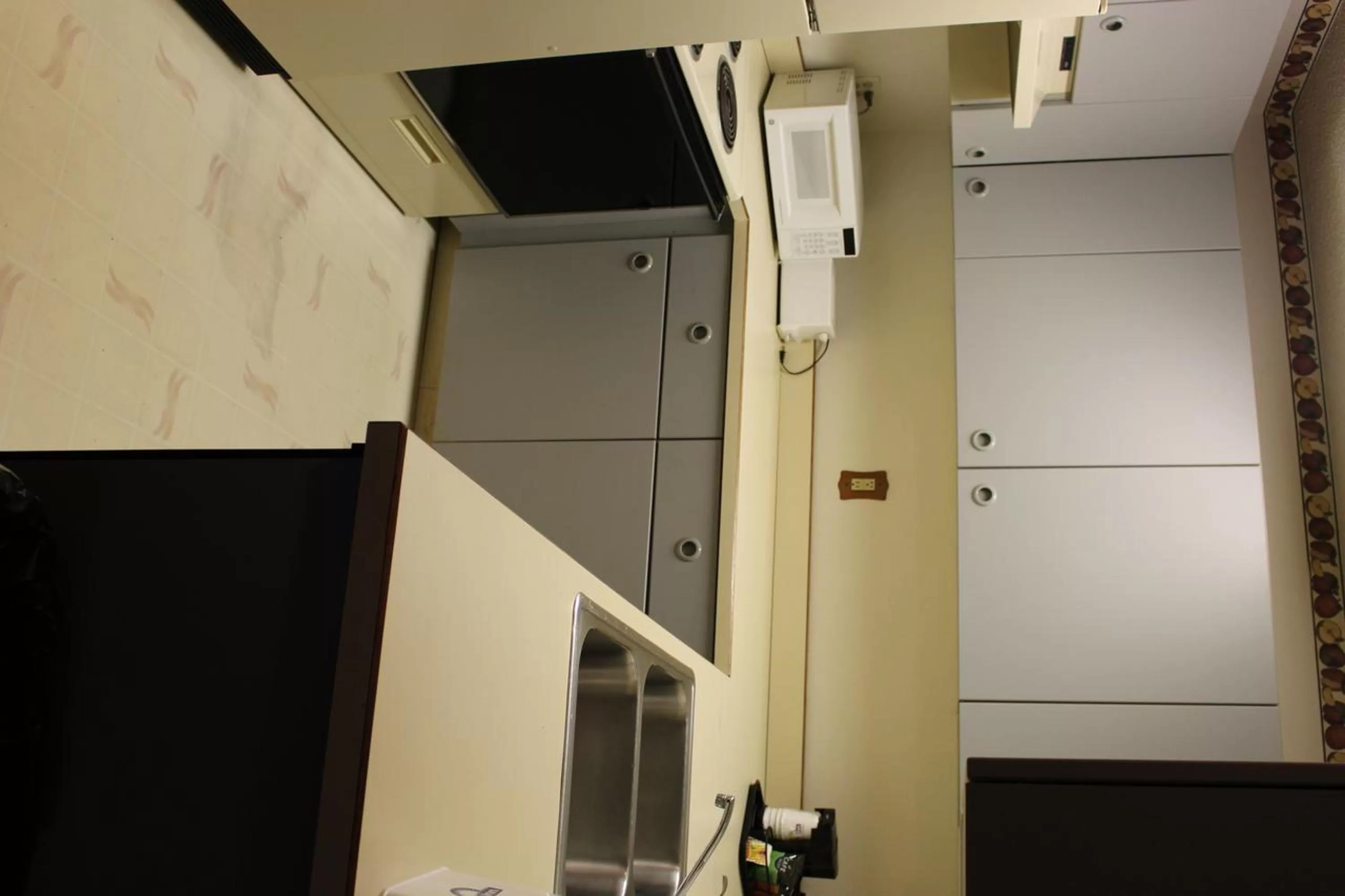 Kitchen or kitchenette in Days Inn by Wyndham Watertown