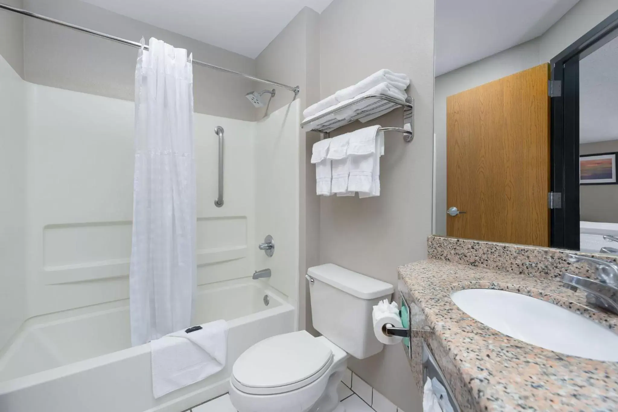 Bathroom in SureStay Plus Hotel Chattanooga Hamilton Place by Best Western