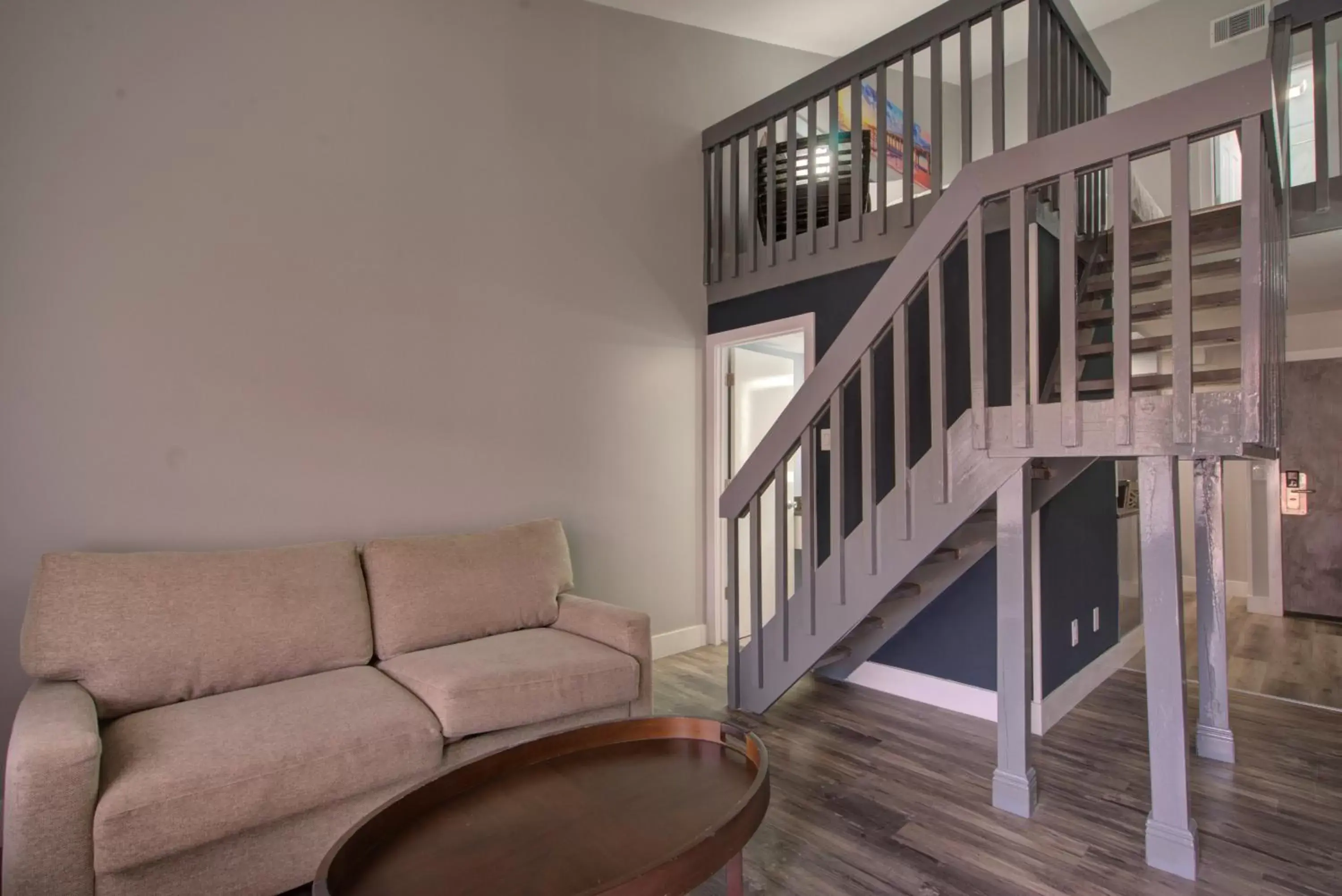 Living room, Seating Area in Clarion Pointe Tampa East near Fairgrounds and Casino