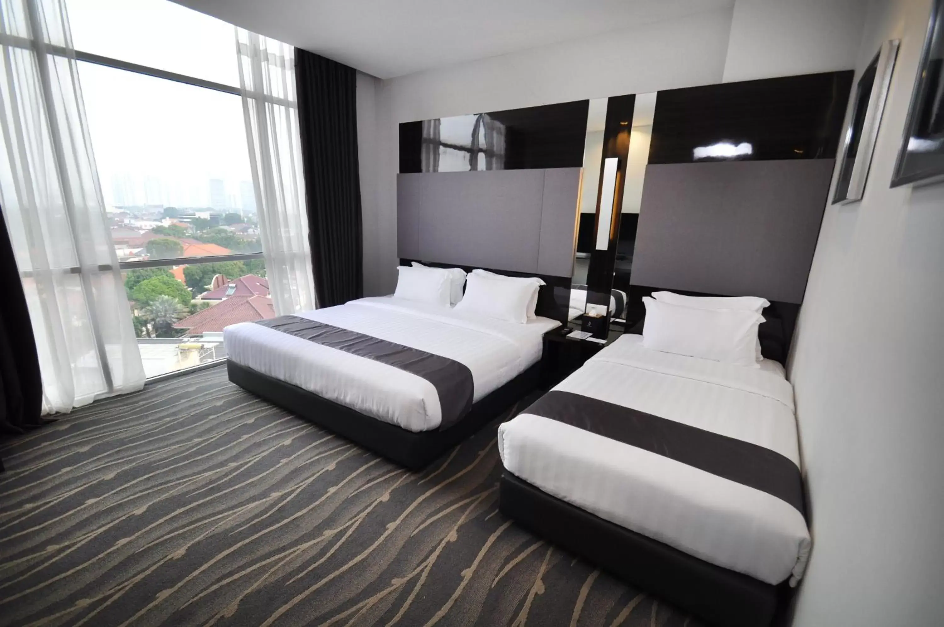 Bed in Dreamtel Jakarta
