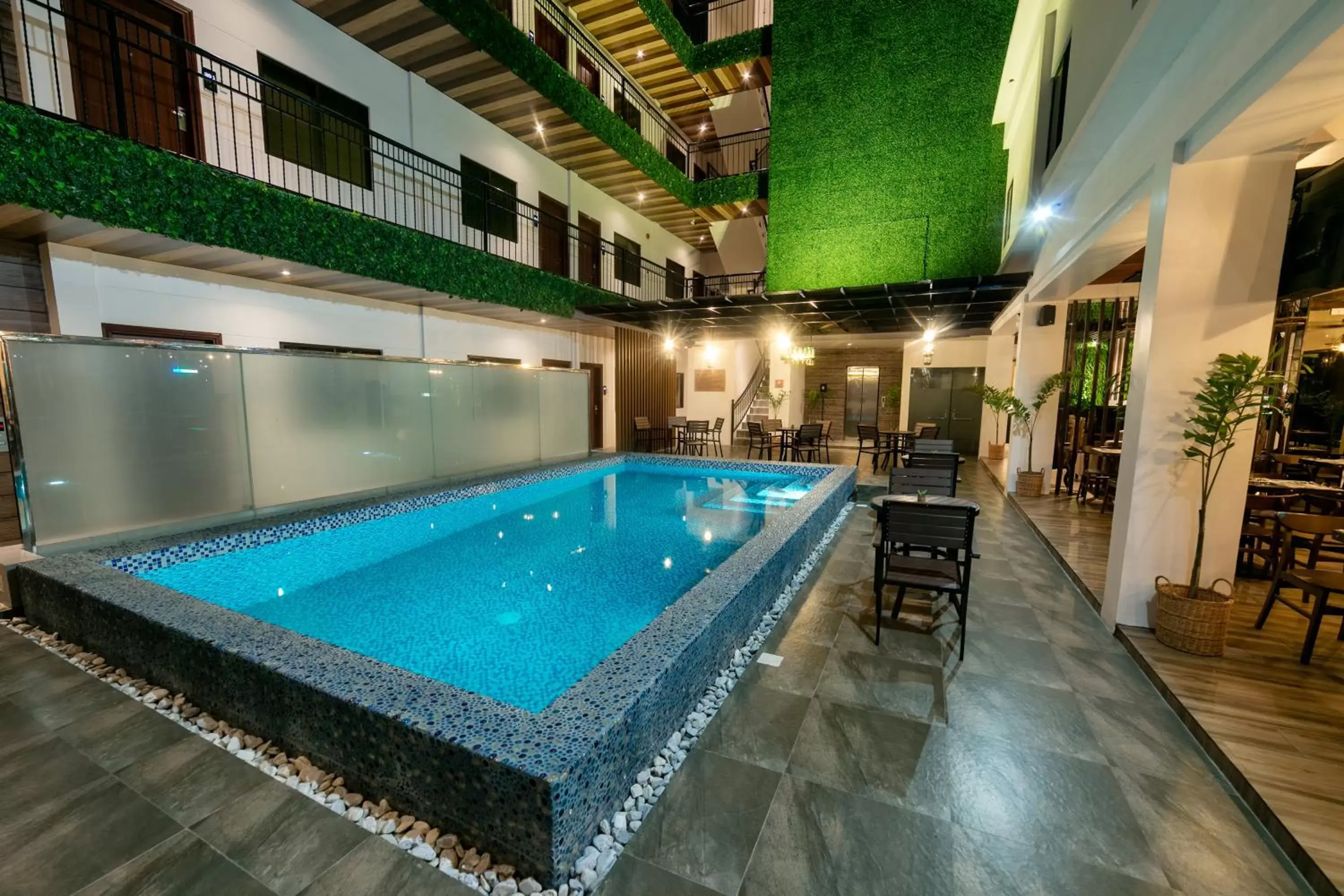 Pool view, Swimming Pool in SureStay Plus Hotel by Best Western AC LUXE Angeles City