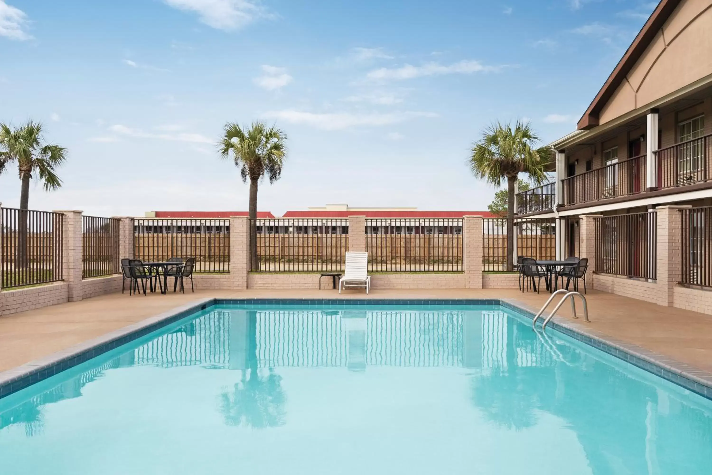 Swimming pool in Super 8 by Wyndham Gulfport Airport NW Near Biloxi Swimming pool in Super 8 by Wyndham Gulfport Airport NW Near Biloxi