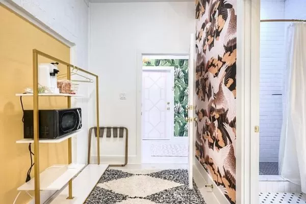 TV/Entertainment Center in THe Oleander Hotel Room Number 4