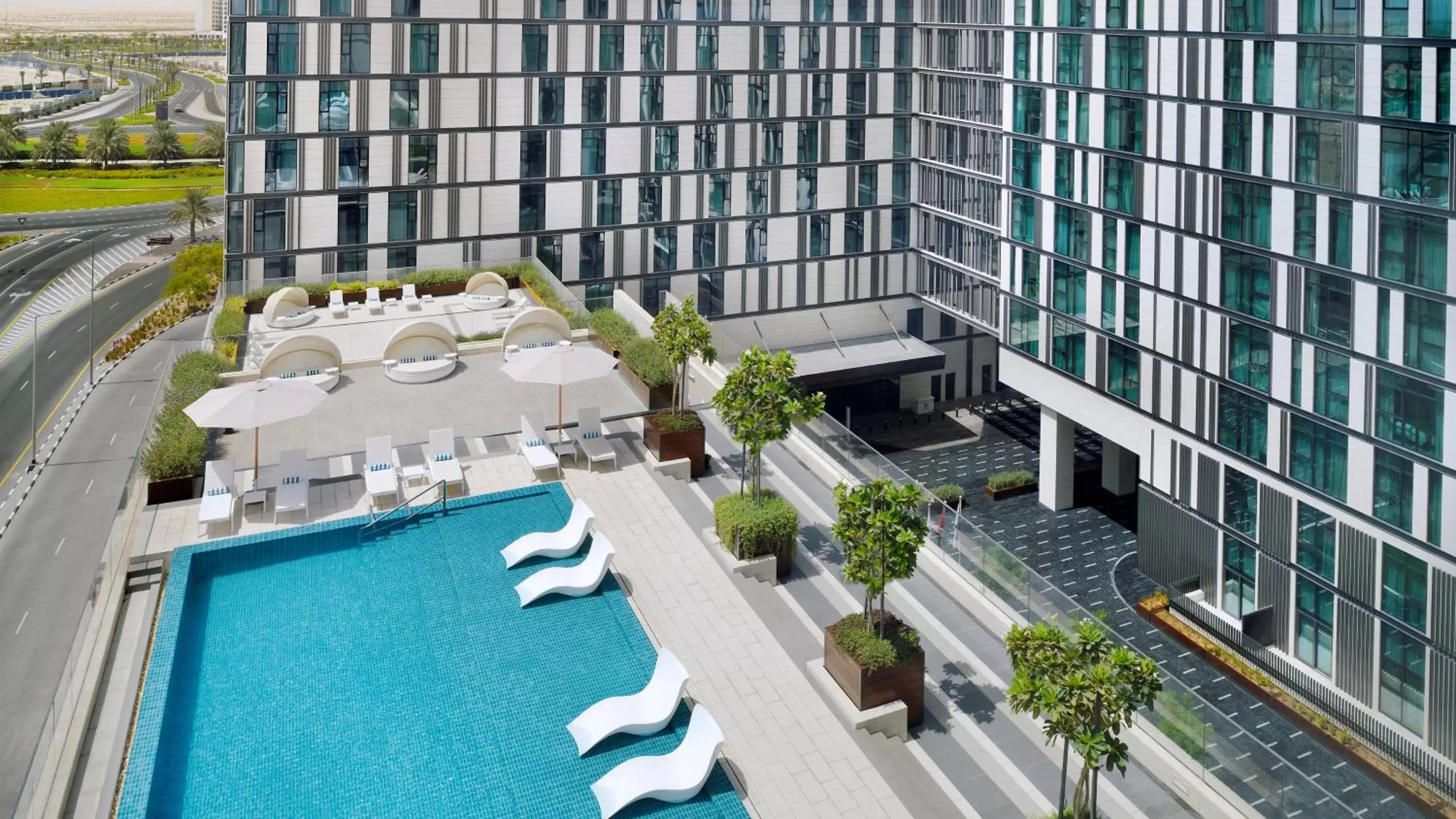 Swimming pool, Pool View in Staybridge Suites Dubai Al-Maktoum Airport, an IHG Hotel