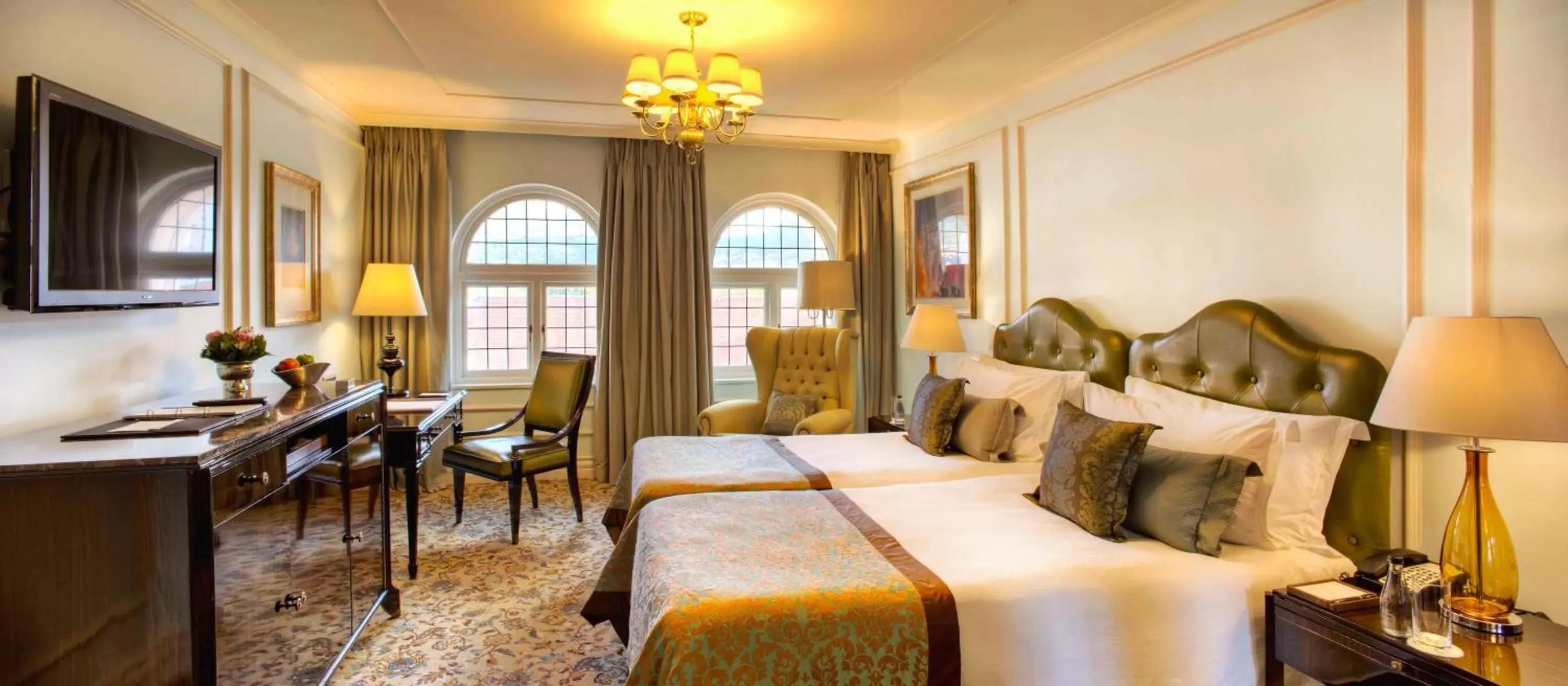 Bed, Seating Area in Taj Cape Town