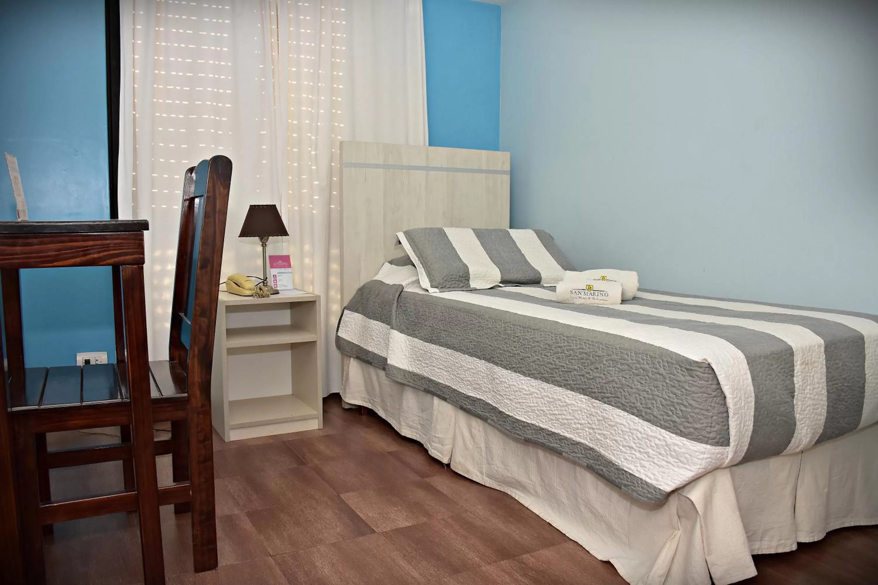 Bed in Hotel San Marino