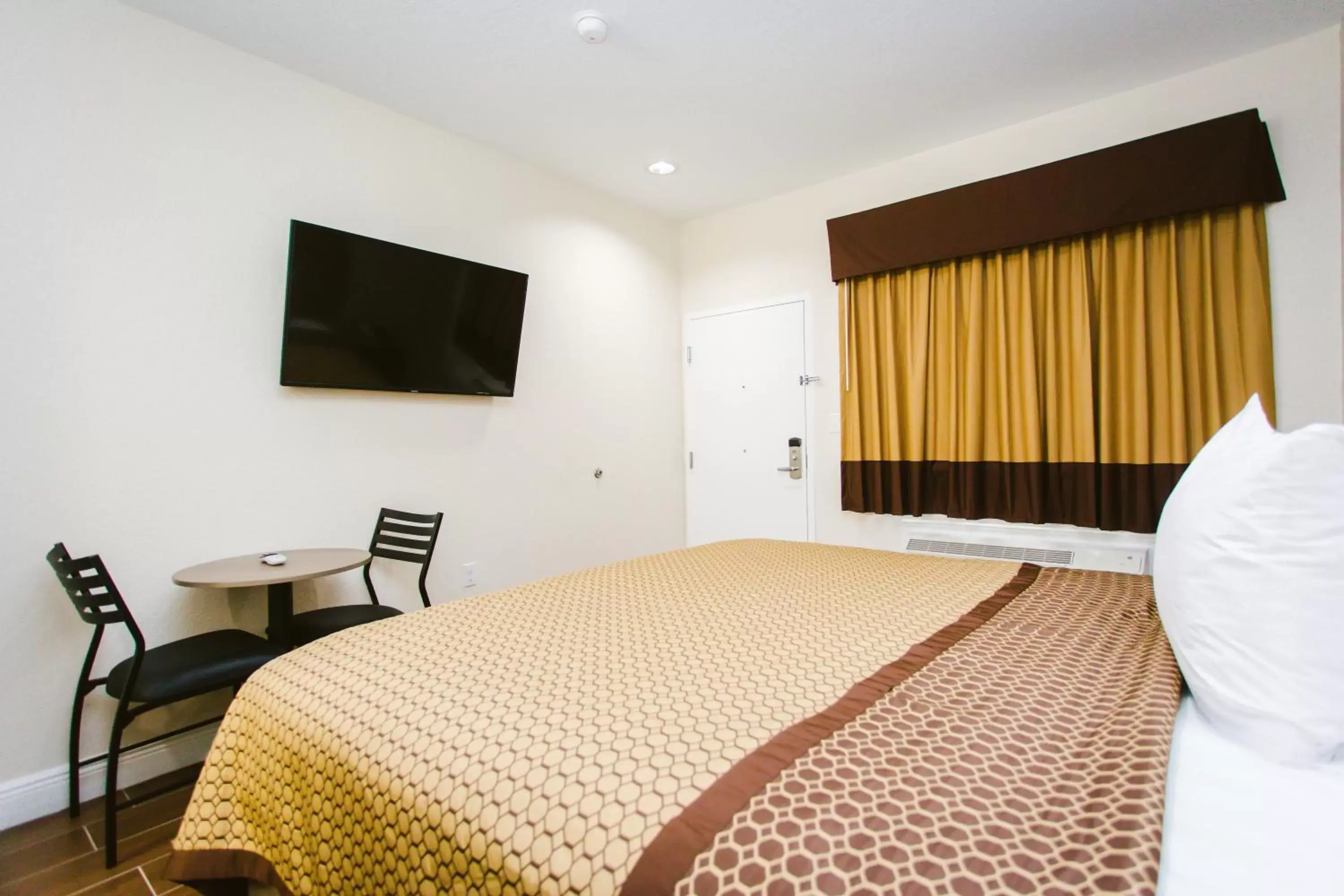 Bed in scottish inn & suites Bed in scottish inn & suites