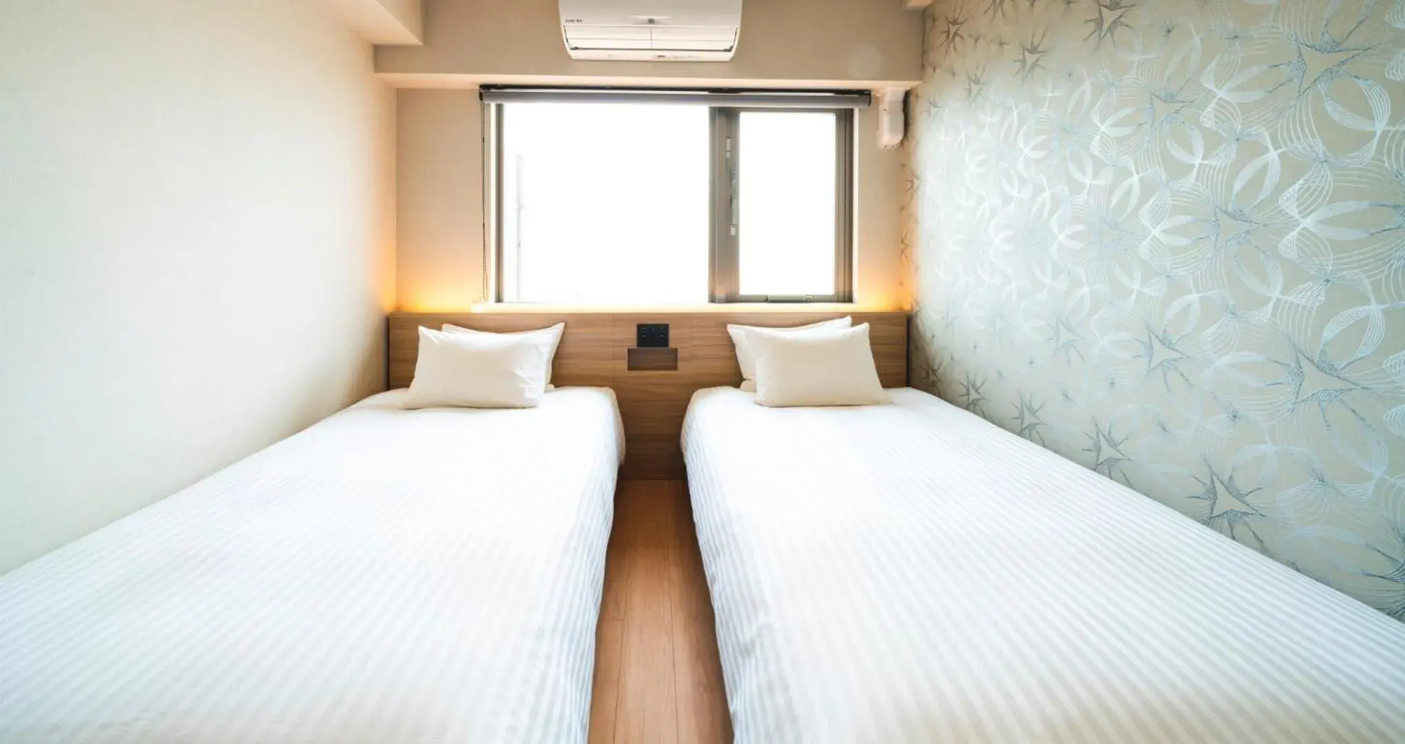 Bed in HOTEL SANSUI NAHA　Ryukyu Hot Spring Naminoueyu