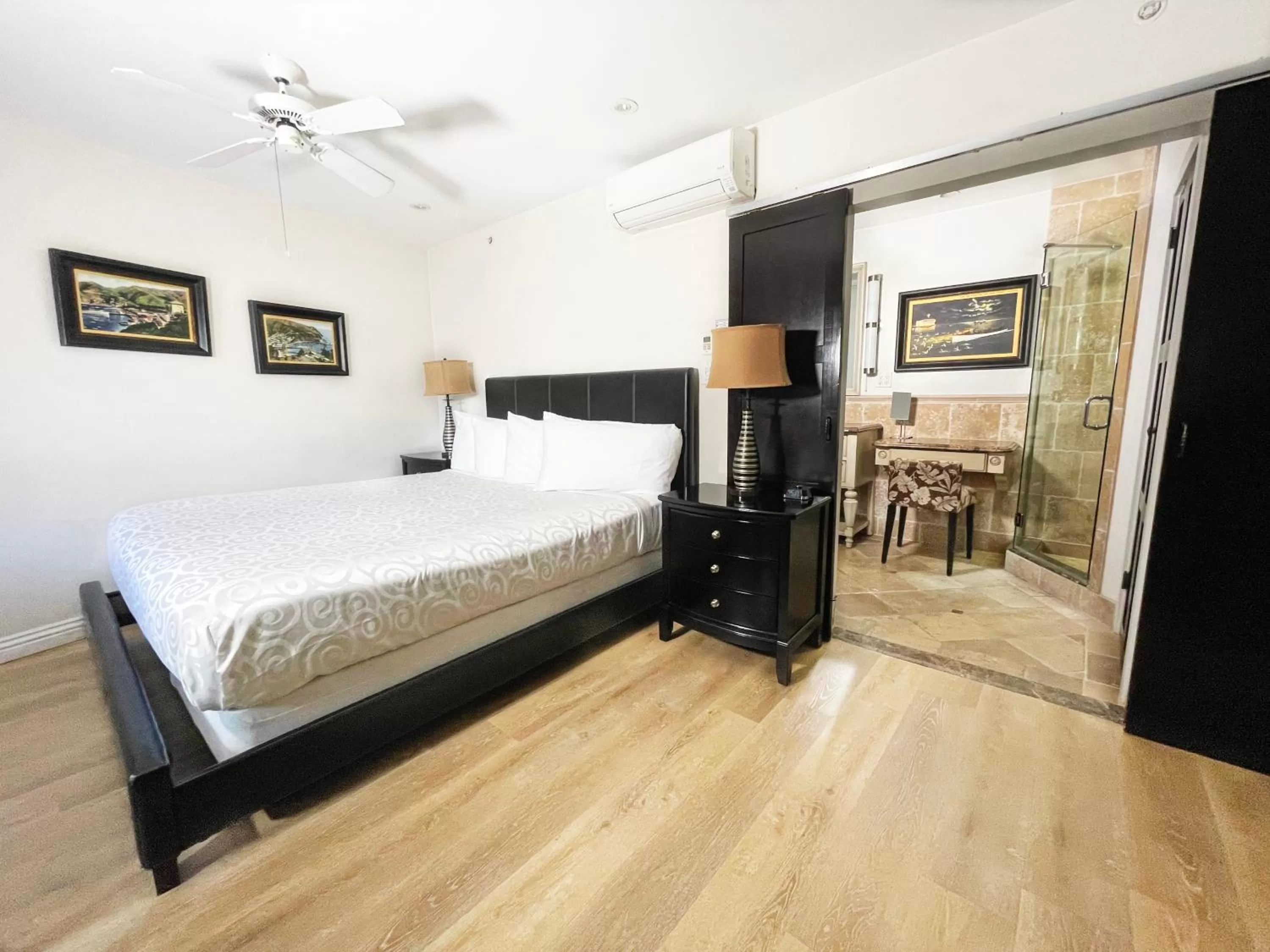 Bed in Catalina Courtyard Suites