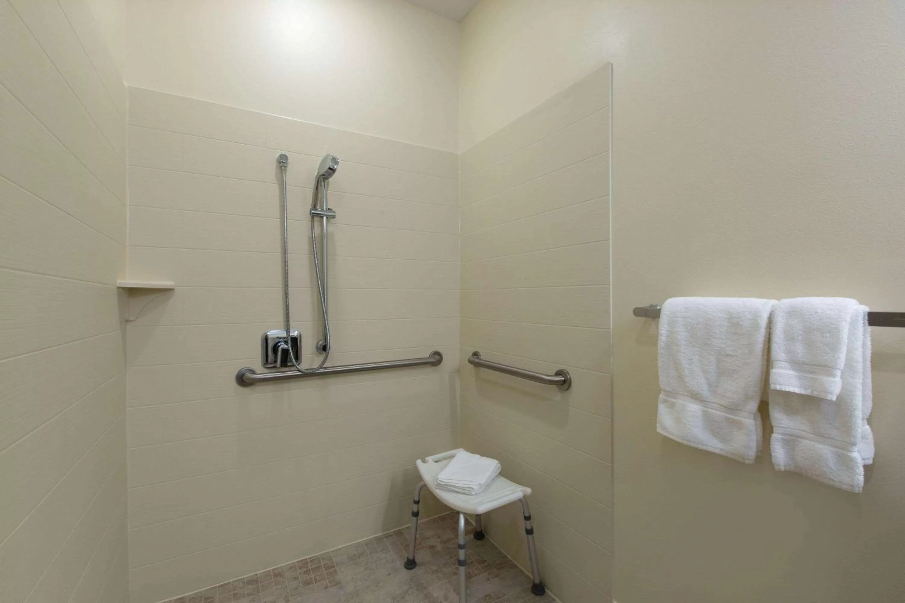 Shower in AmericInn by Wyndham Sioux Falls North
