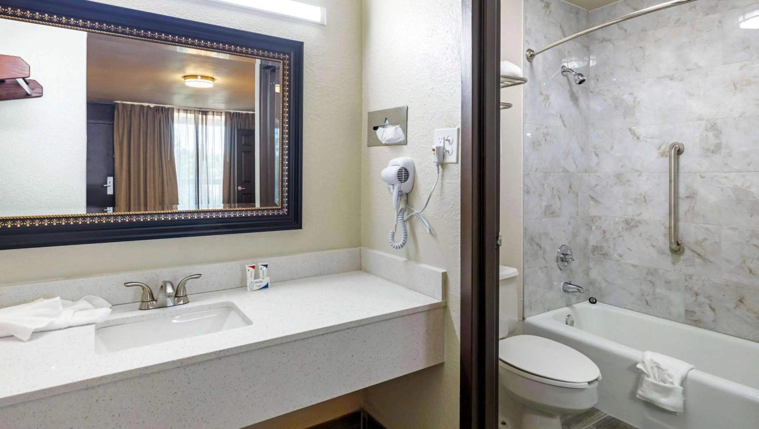 Bathroom in Magnuson Grand Hotel and Conference Center Tyler