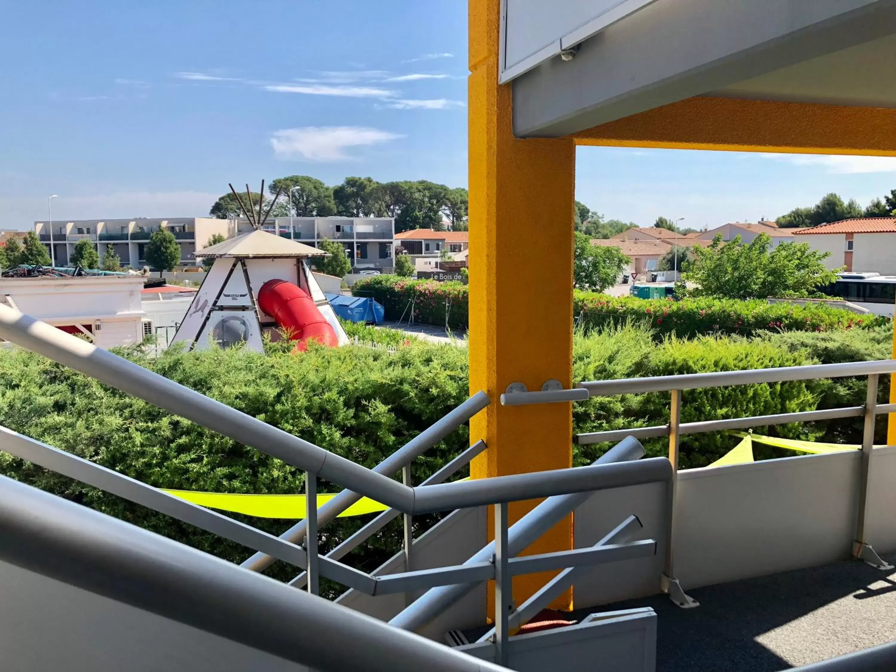 Garden view, Balcony/Terrace in Premiere Classe Perpignan Sud