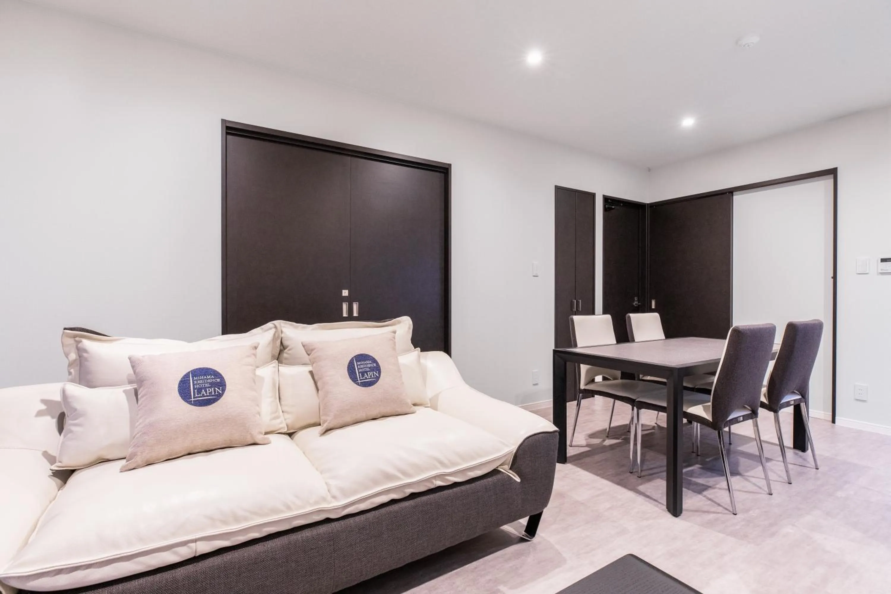 Living room, Bed in LAPIN MIHAMA Residence Hotel