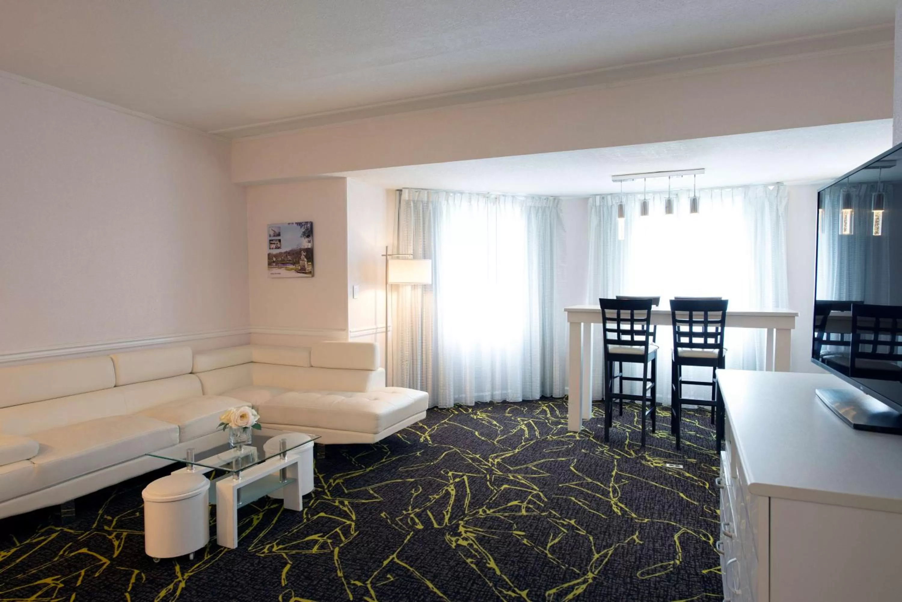 Living room in The Roslyn, Tapestry Collection by Hilton