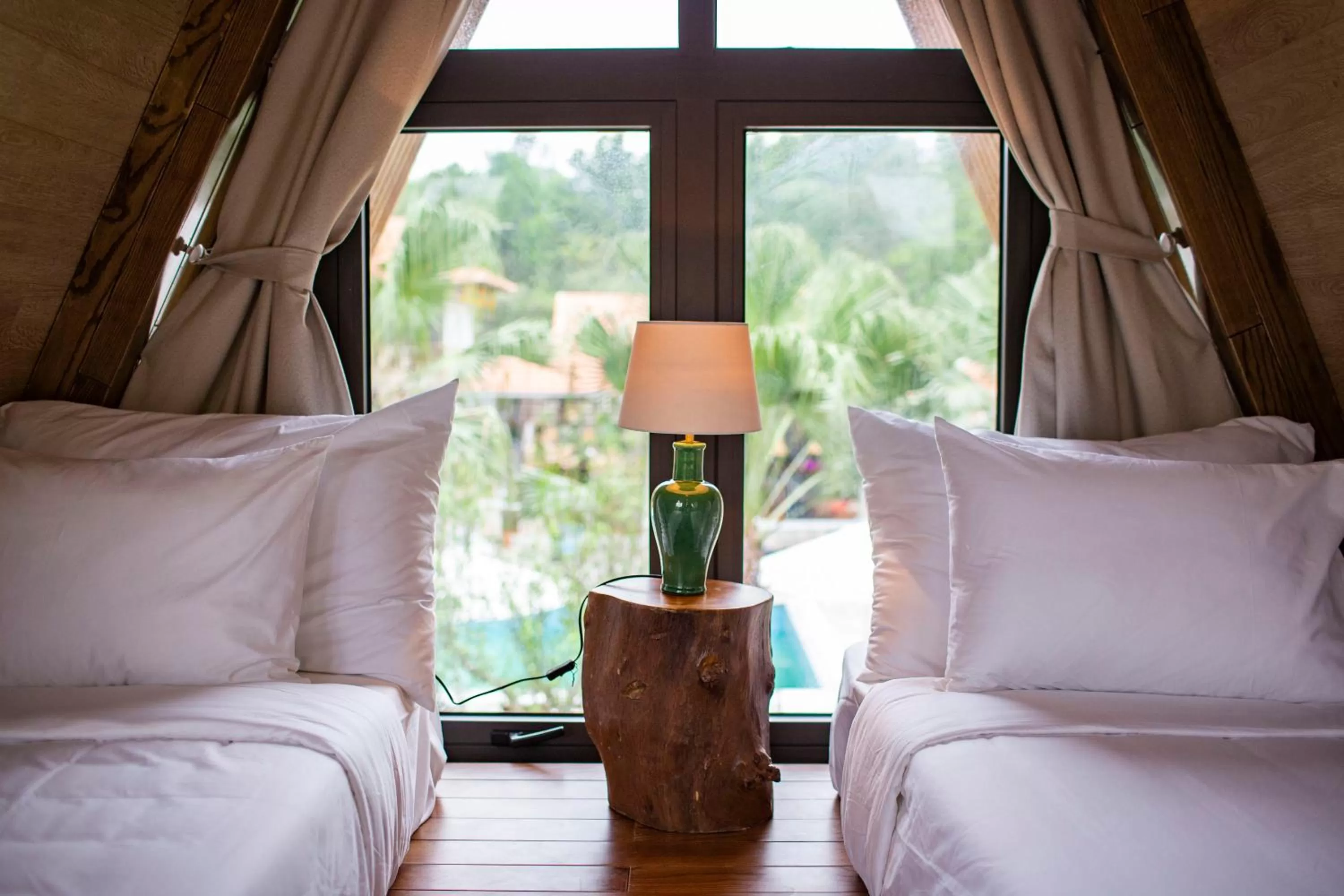 Bed in Bai Dinh Garden Resort & Spa