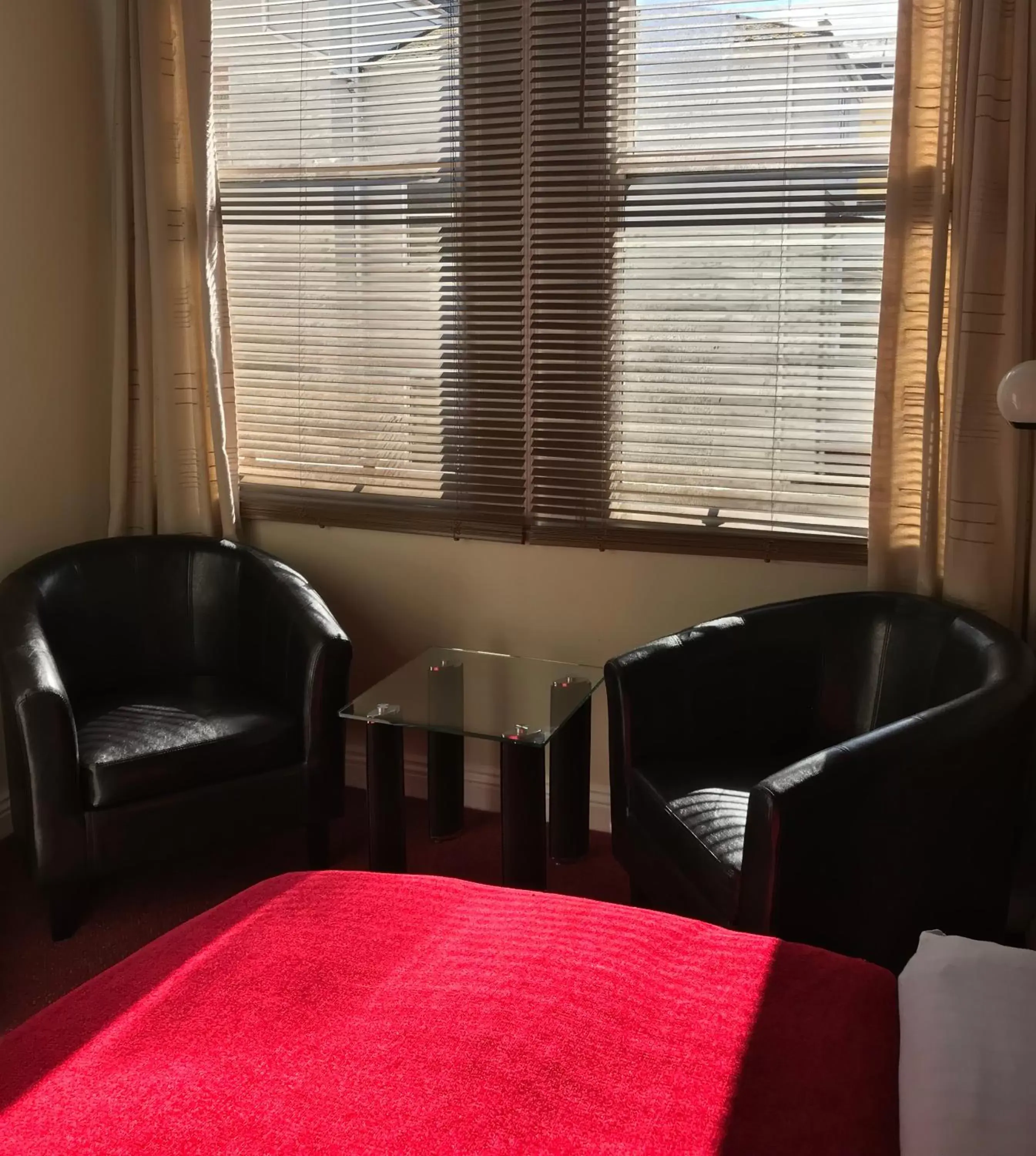 Bedroom, Seating Area in Cassandra Guest House